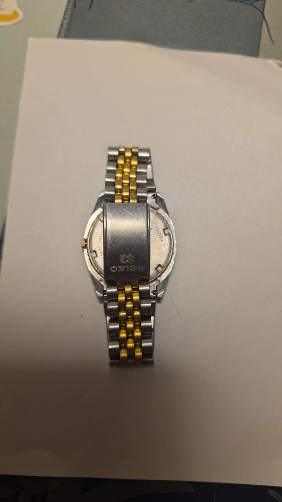 Seiko Quartz Two-Tone Stainless Bracelet Roman White Dial Day/Date Dress Watch