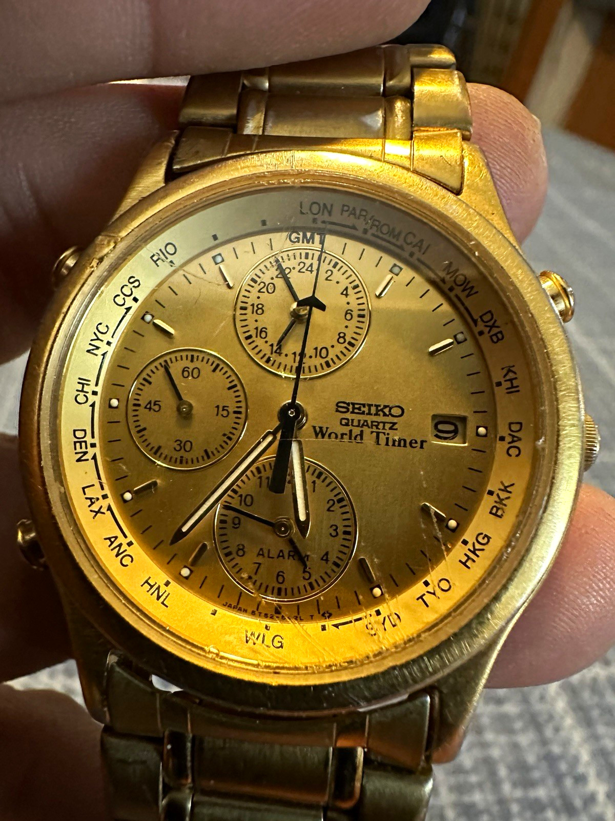 Seiko Quartz World Timer World Time Alarm Date Gold Tone Analog Bracelet