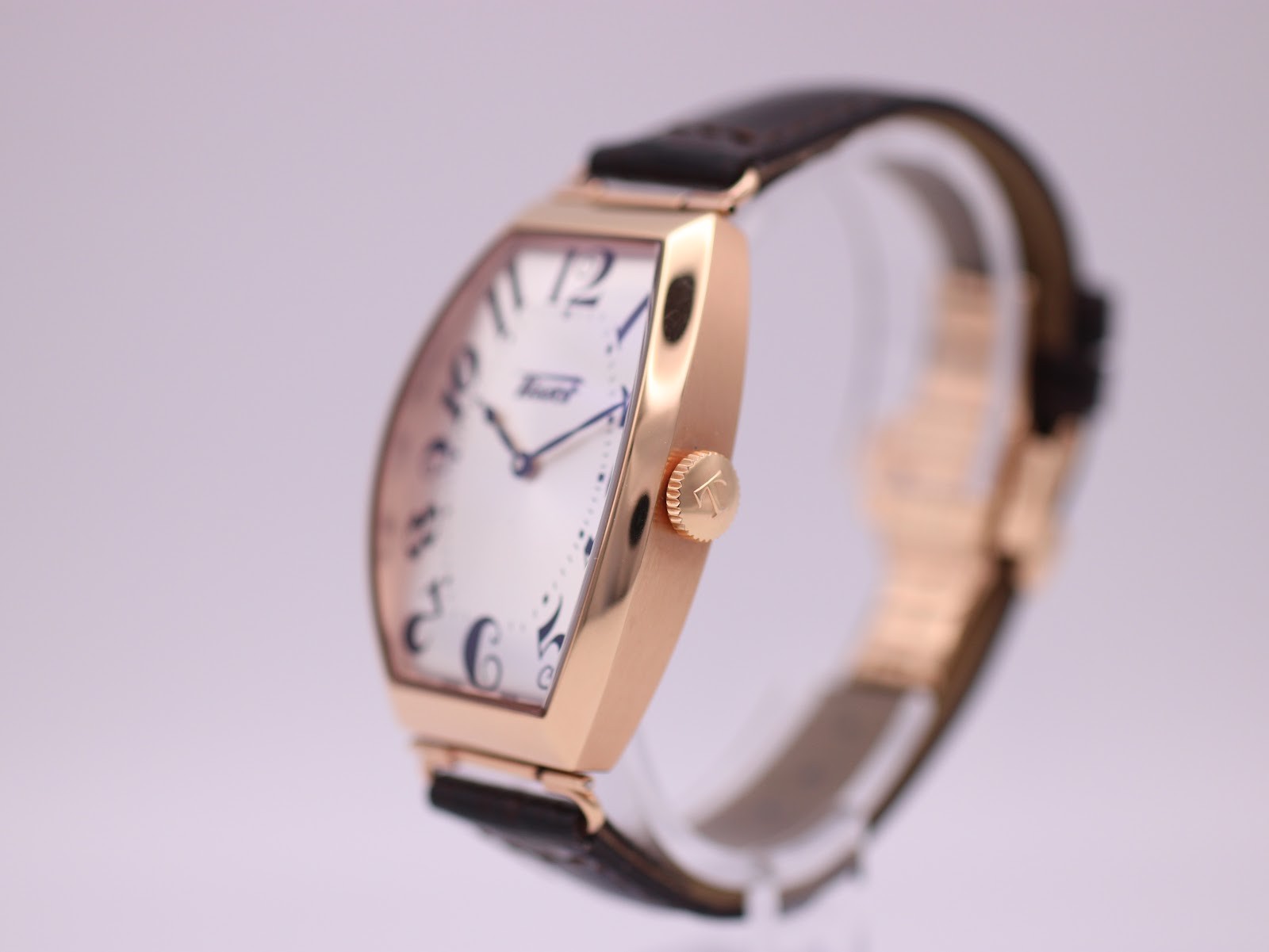 Tissot T128509 A tonneau rose gold PVD quartz watch with cream dial, original bo