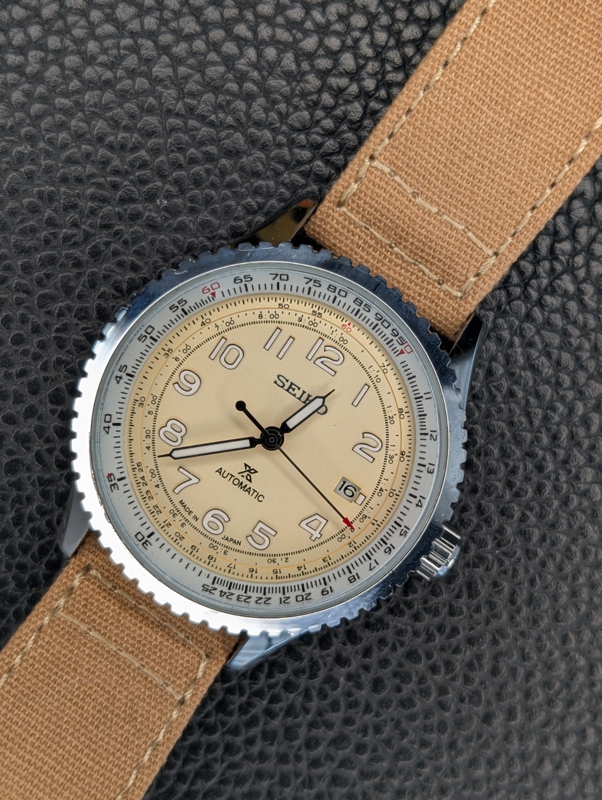 Seiko 4R35 Automatic Cream Dial Slide Rule Bezel Date Canvas Strap 100m 42mm