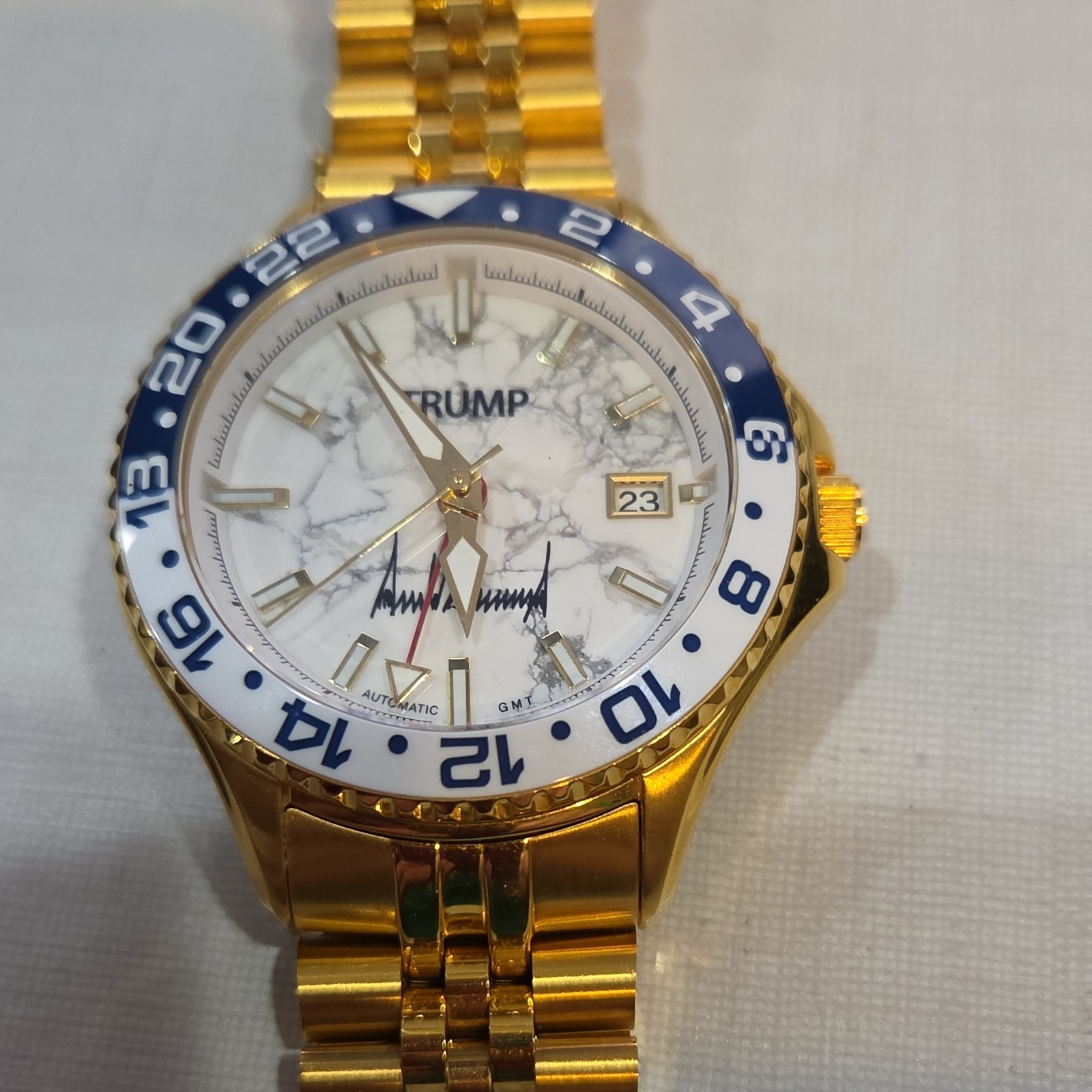 TRUMP 45-47 Men’s Automatic GMT Date 50m Fight Fight Fight White Marble RARE