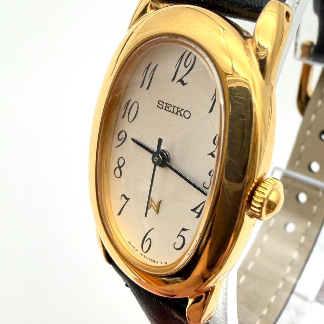 Excellent condition Seiko watch, new battery, new strap, oval shape, gold, women