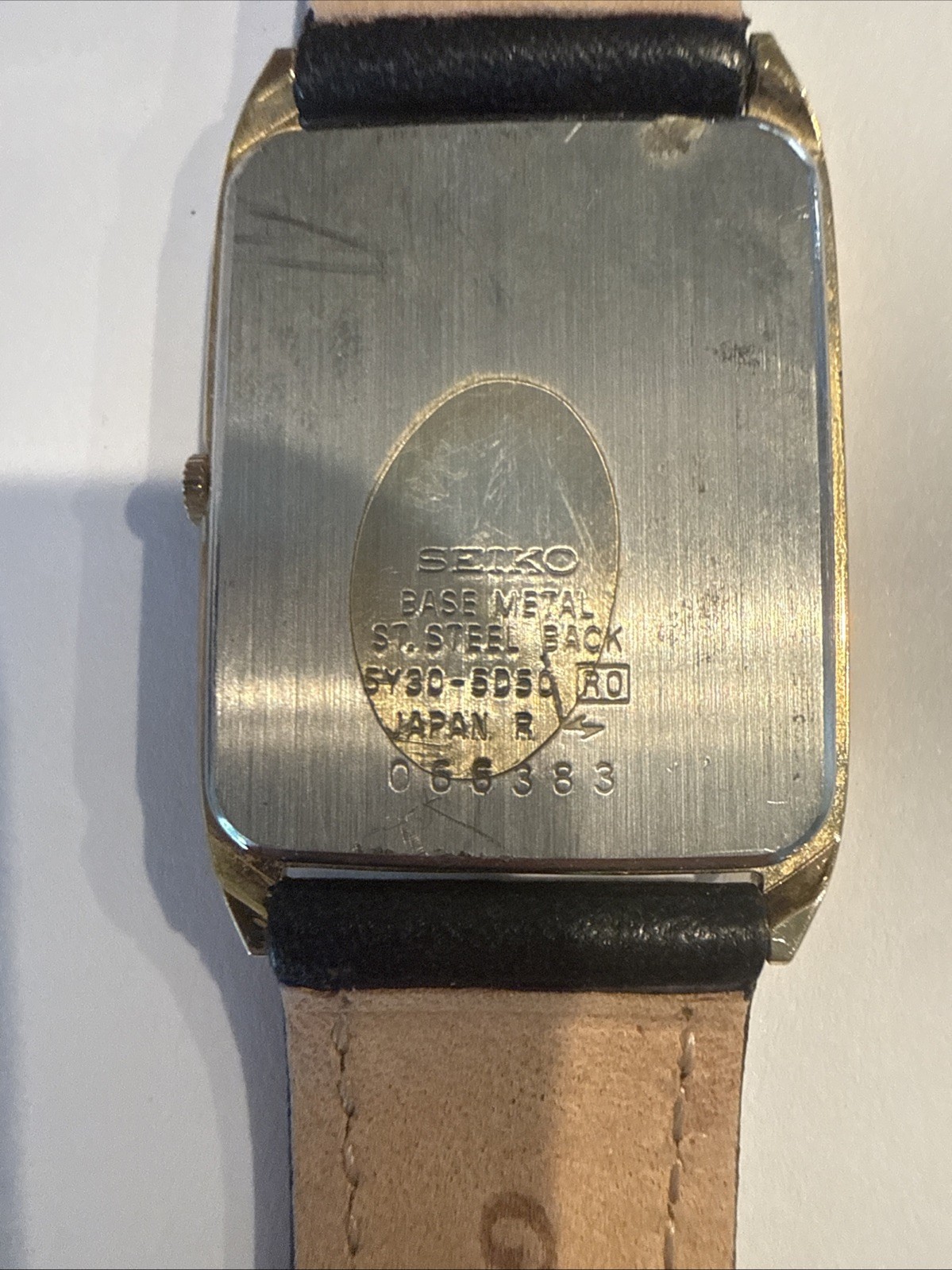 Seiko Men’s Gold Quartz Rectangular Wristwatch Black Dial Black Leather Band