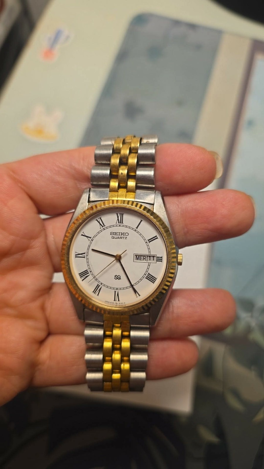 Seiko Quartz Two-Tone Stainless Bracelet Roman White Dial Day/Date Dress Watch