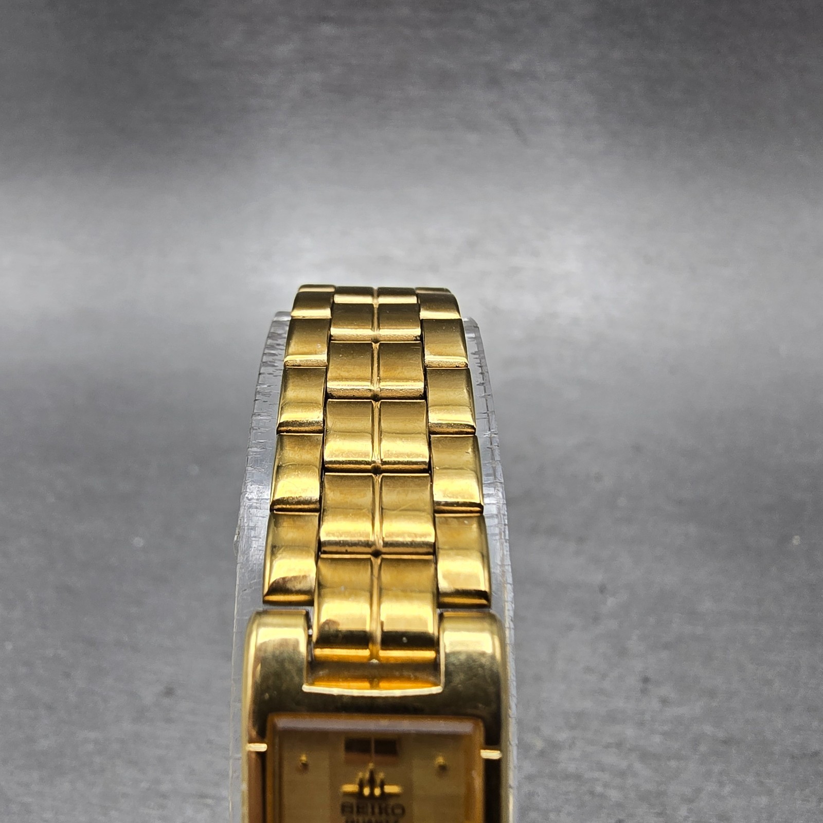 Seiko Tank Watch Women 13mm Champagne Dial Gold Tone 2E20-6590 New Battery VTG J