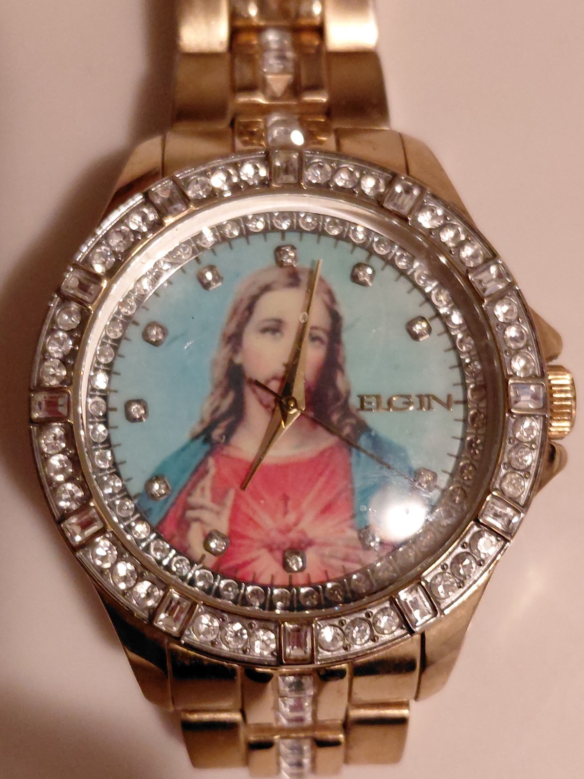 Elgin FG9116 Women’s Analog Quartz Religious Dial Gold Tone Bracelet Watch