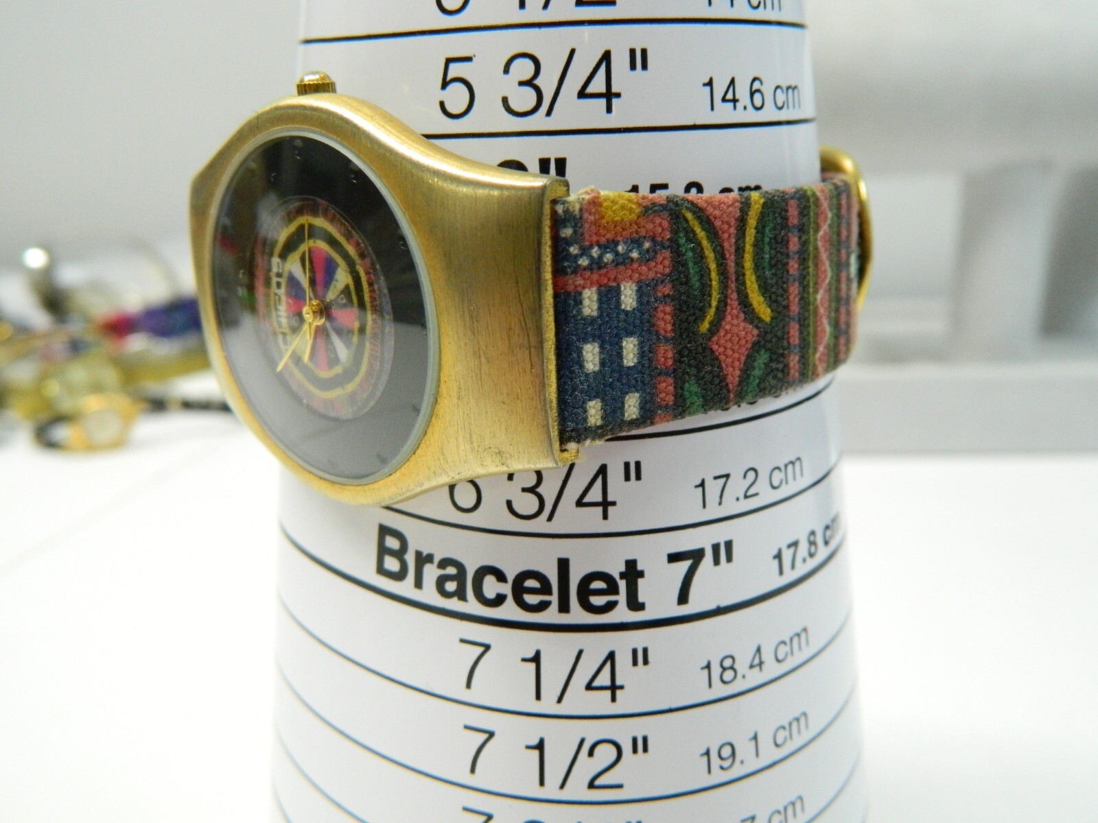 CHICO’S FUNKY Psychedelic brushed gold tone lady’s watch/wristwatch