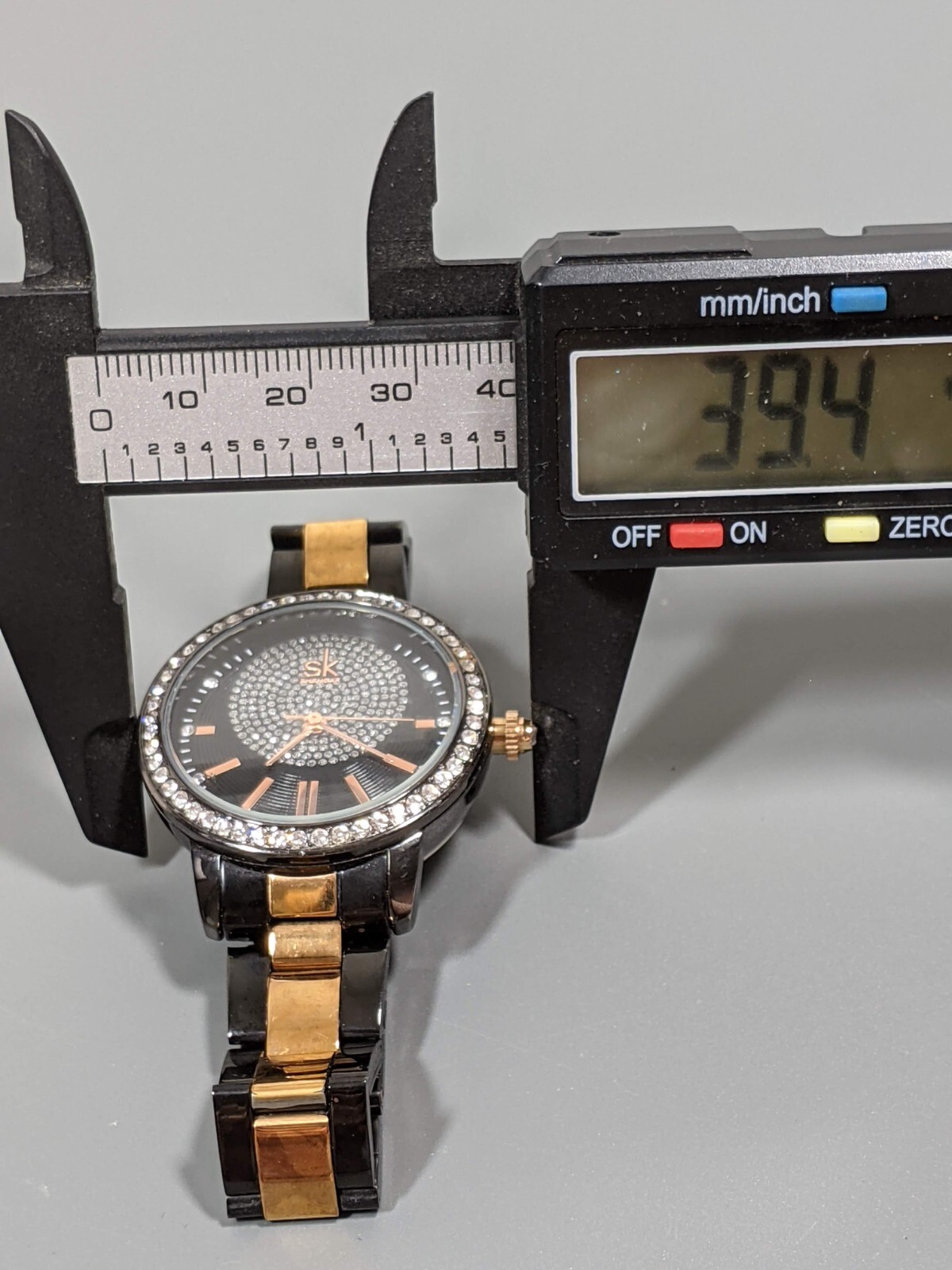 Shengke SK Womans Gunmetal Gray Gold Tone Crystal Accent Watch 6.75 in