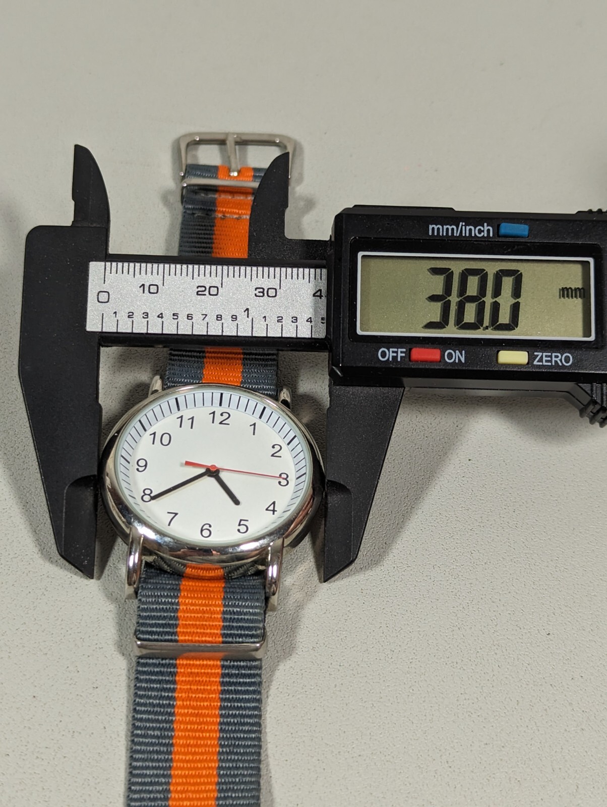 Unisex White Dial Round Silver Tone Case Gray Orange Canvas Band Watch