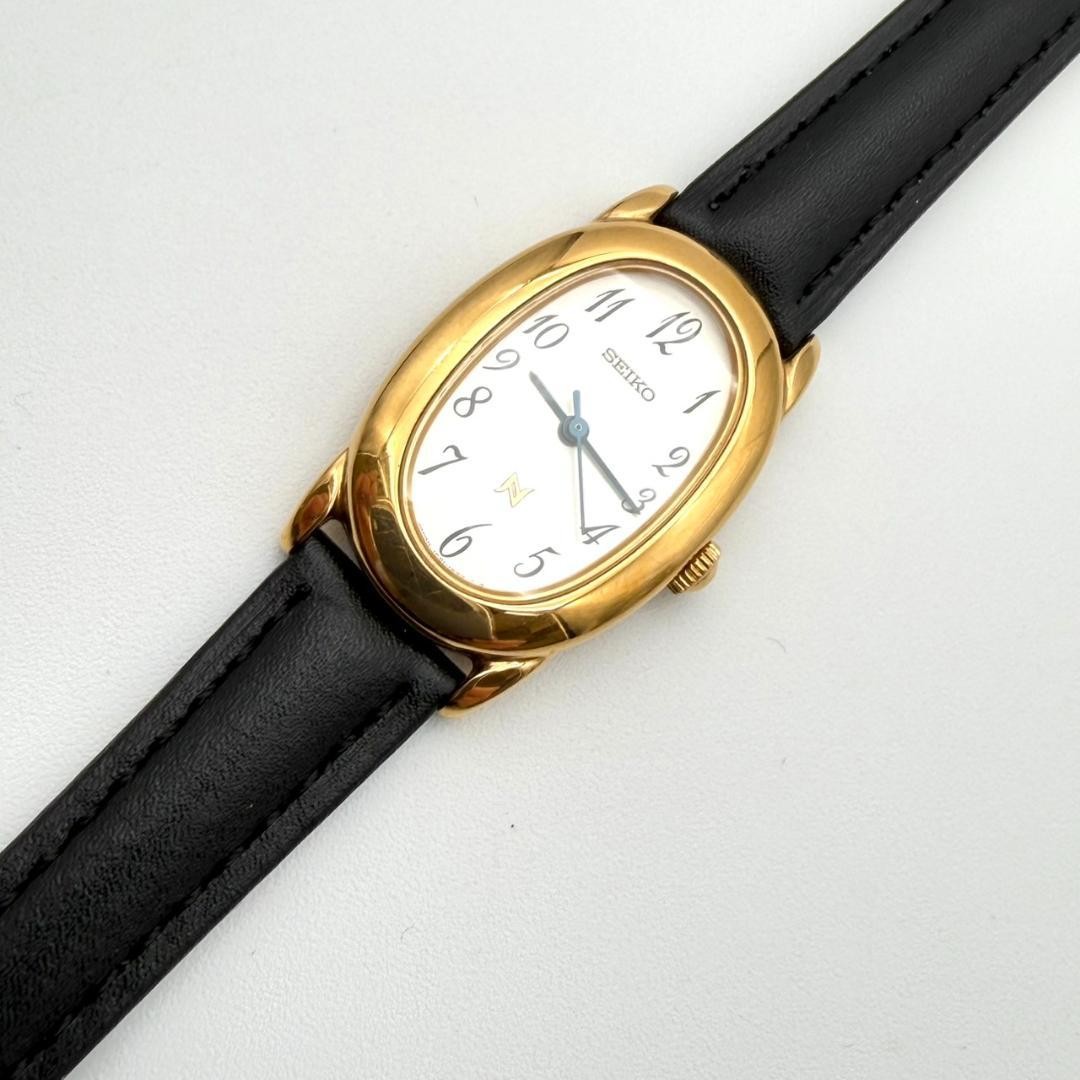 Excellent condition Seiko watch, new battery, new strap, oval shape, gold, women