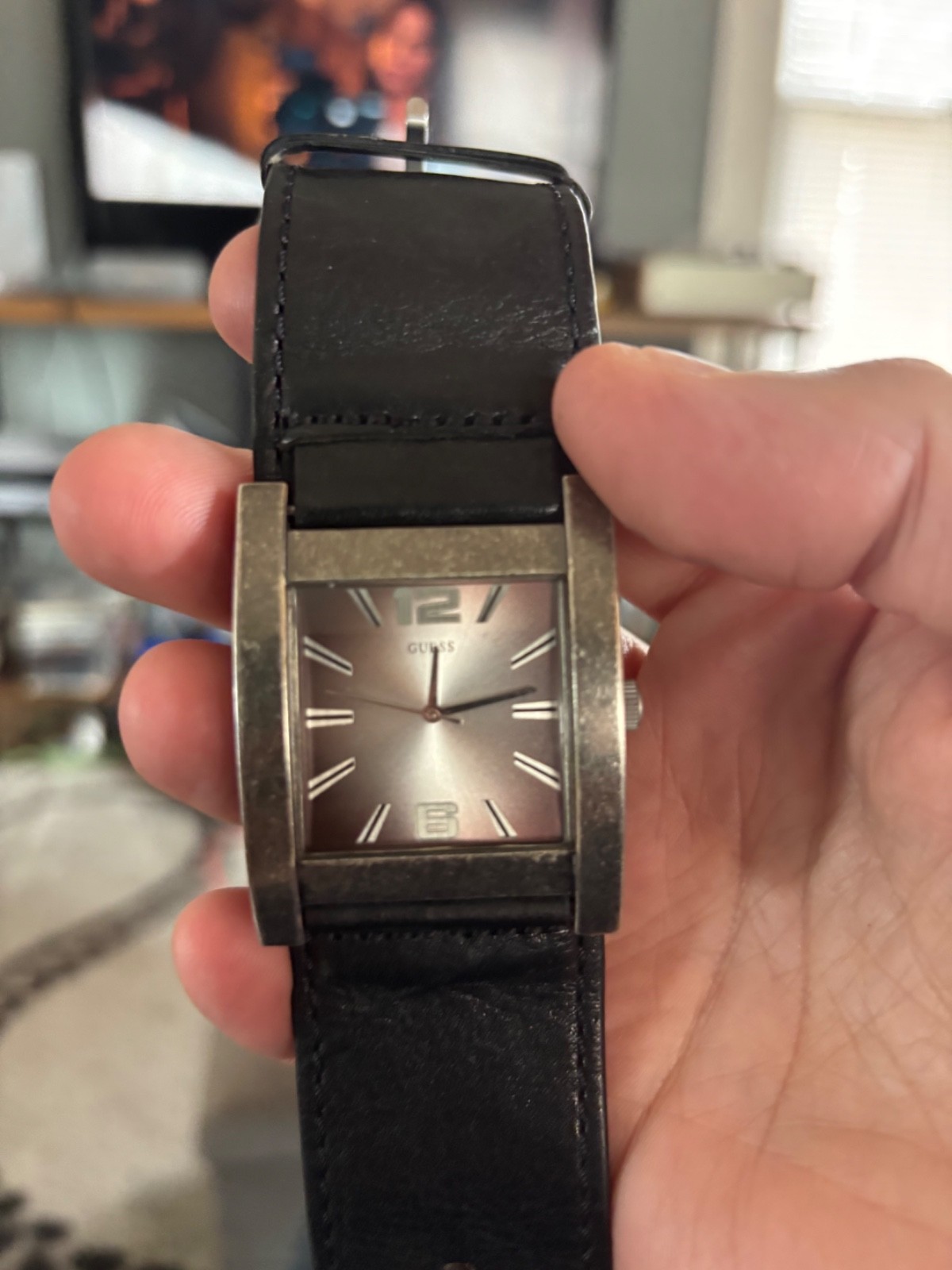 GUESS BRUSHED AGED SILVER TONE,BLACK LEATHER CUFF BAND WATCH U75016G1