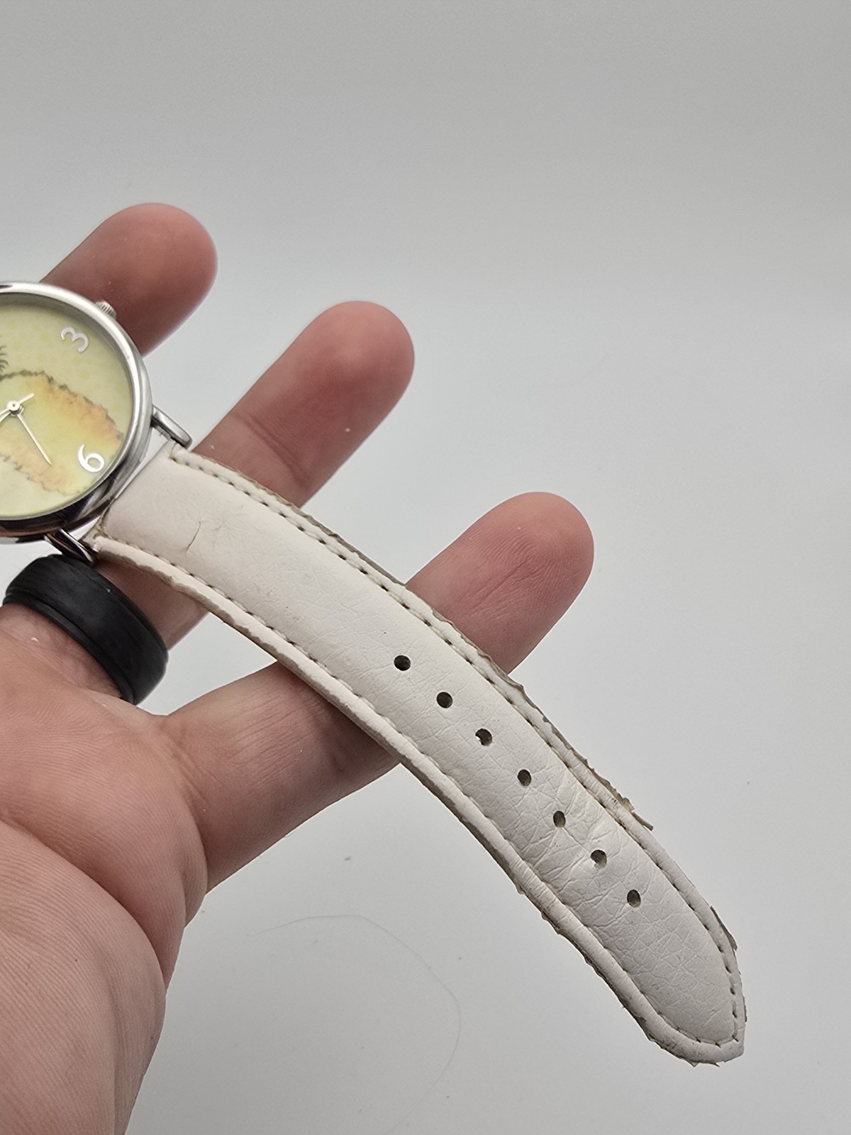 Avon Quartz Analog Wristwatch Pineapple Dial Silver SS Case White Leather Strap