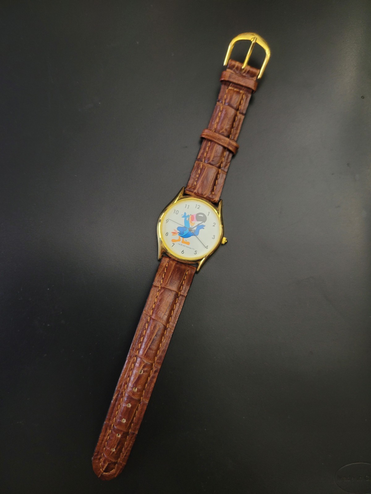 Kellogg Toucan Sam Wristwatch Gold Tone Brown Leather Strap- needs battety