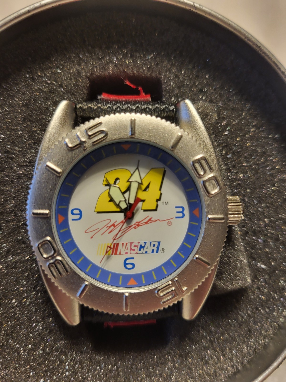NASCAR 24 Quartz Analog 45mm Stainless Steel Watch, Red/Black Leather, Tin