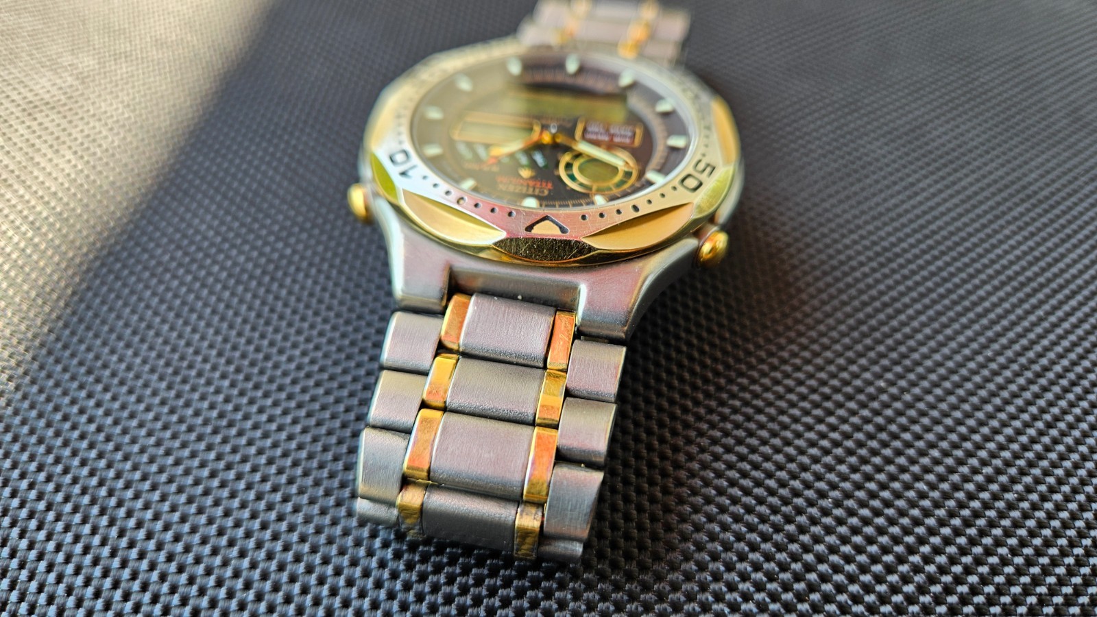 Citizen Promaster Pace Timer Titanium WR100 C130-089685 two-tone gold accents