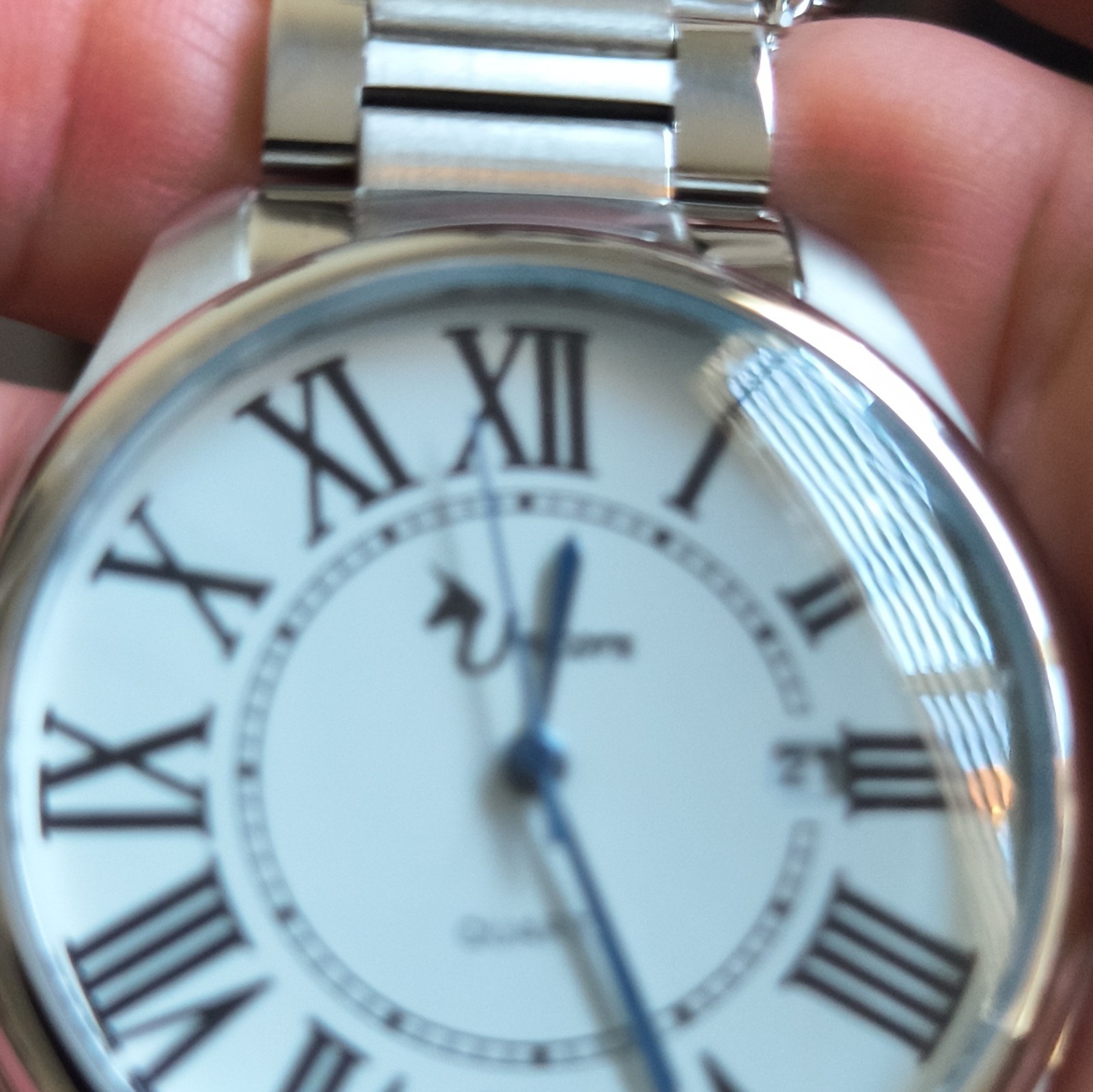 Unicorn Quartz Analog Watch White Dial Roman Numerals Silver Steel Date 30m