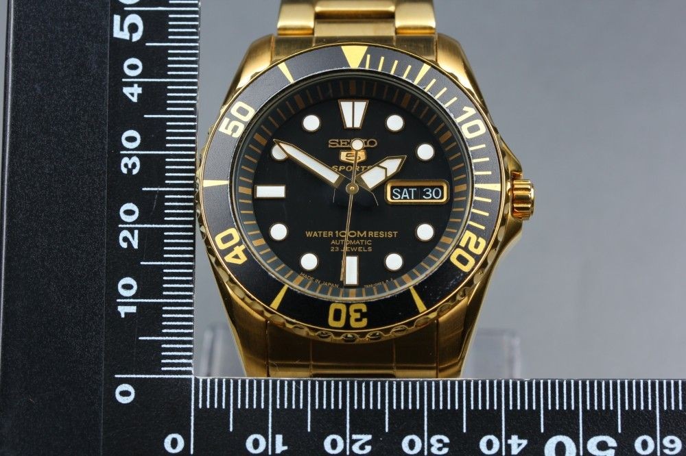 Working item SEIKO 5 Sports SNZF22 7S36 03C0 black gold automatic men s 17274