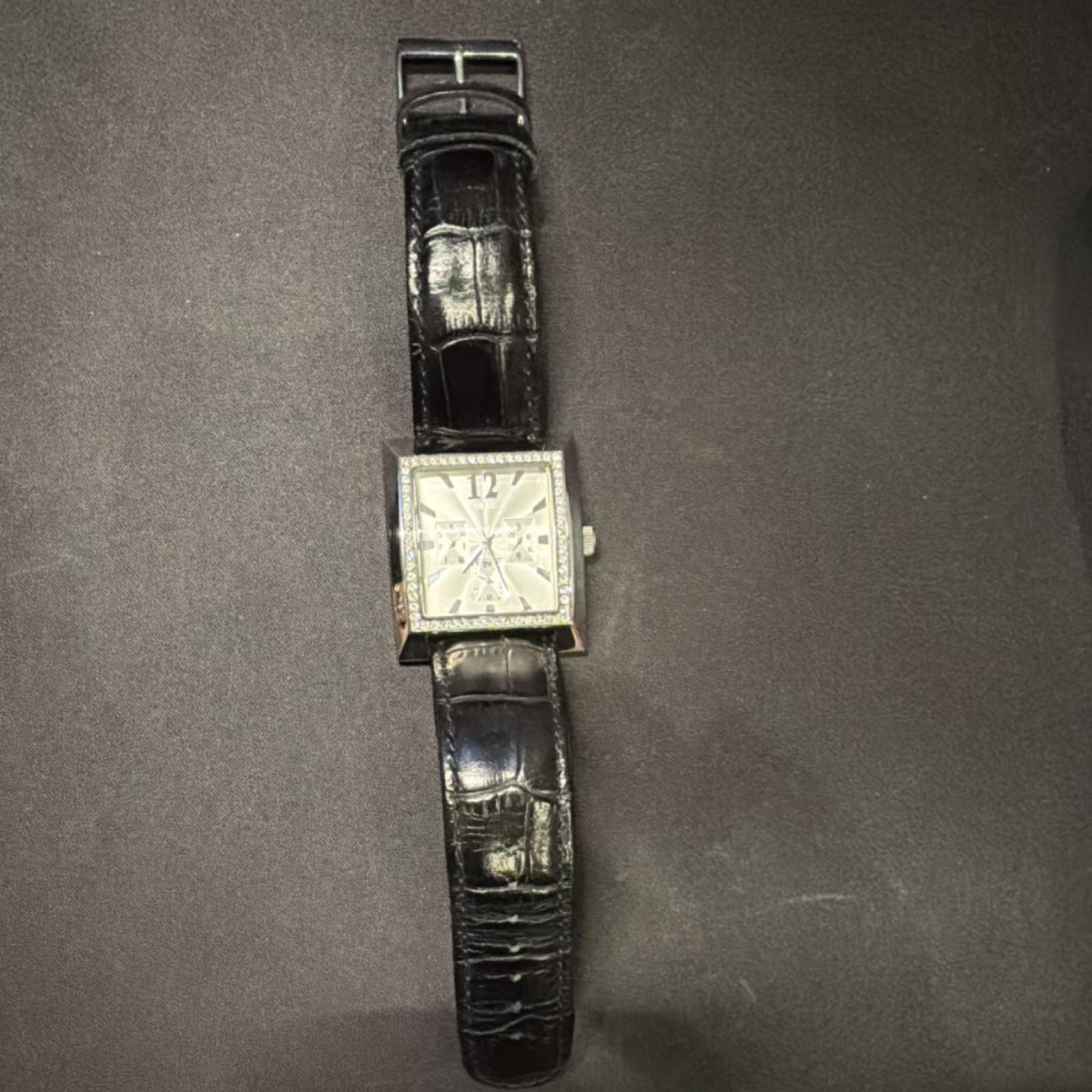 GUESS Timeless Beauty Women’s Quartz Square Silver Dial Black Leather Strap