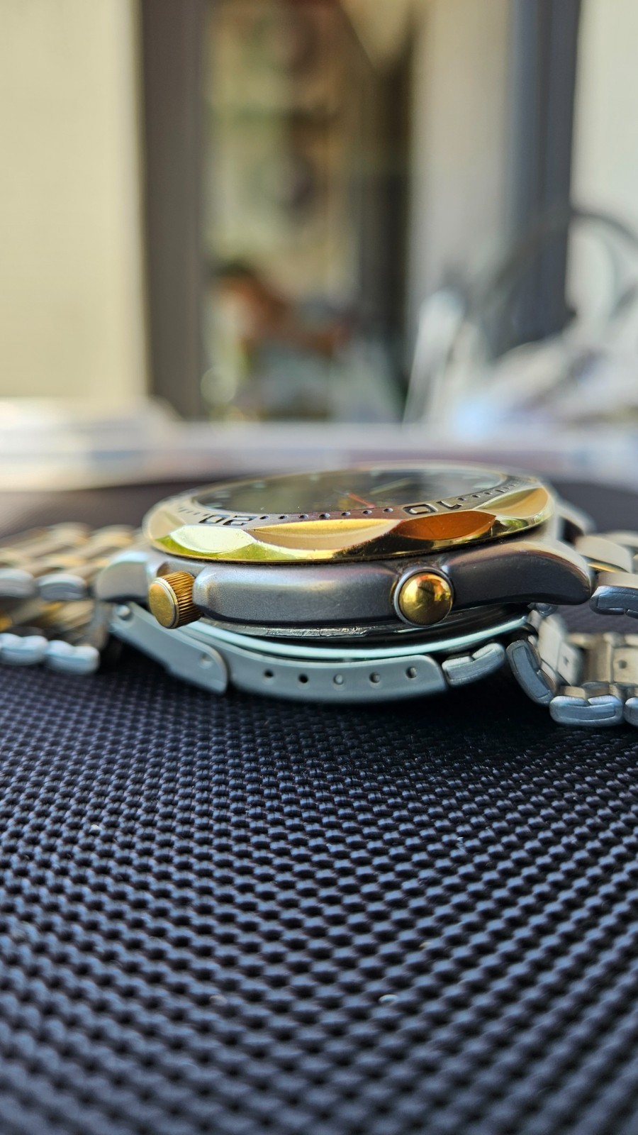 Citizen Promaster Pace Timer Titanium WR100 C130-089685 two-tone gold accents