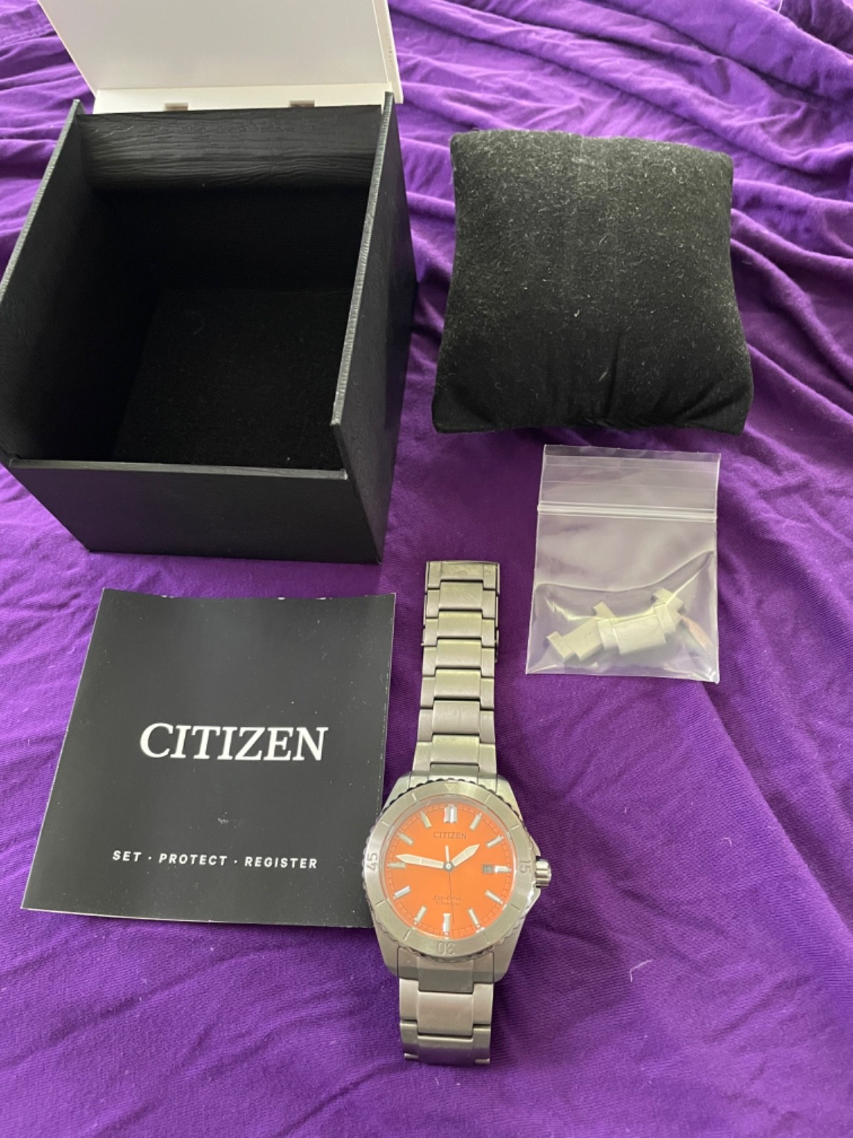 Citizen Men’s Watch Brycen Eco-Drive Orange Dial Titanium Bracelet AW1840-50X