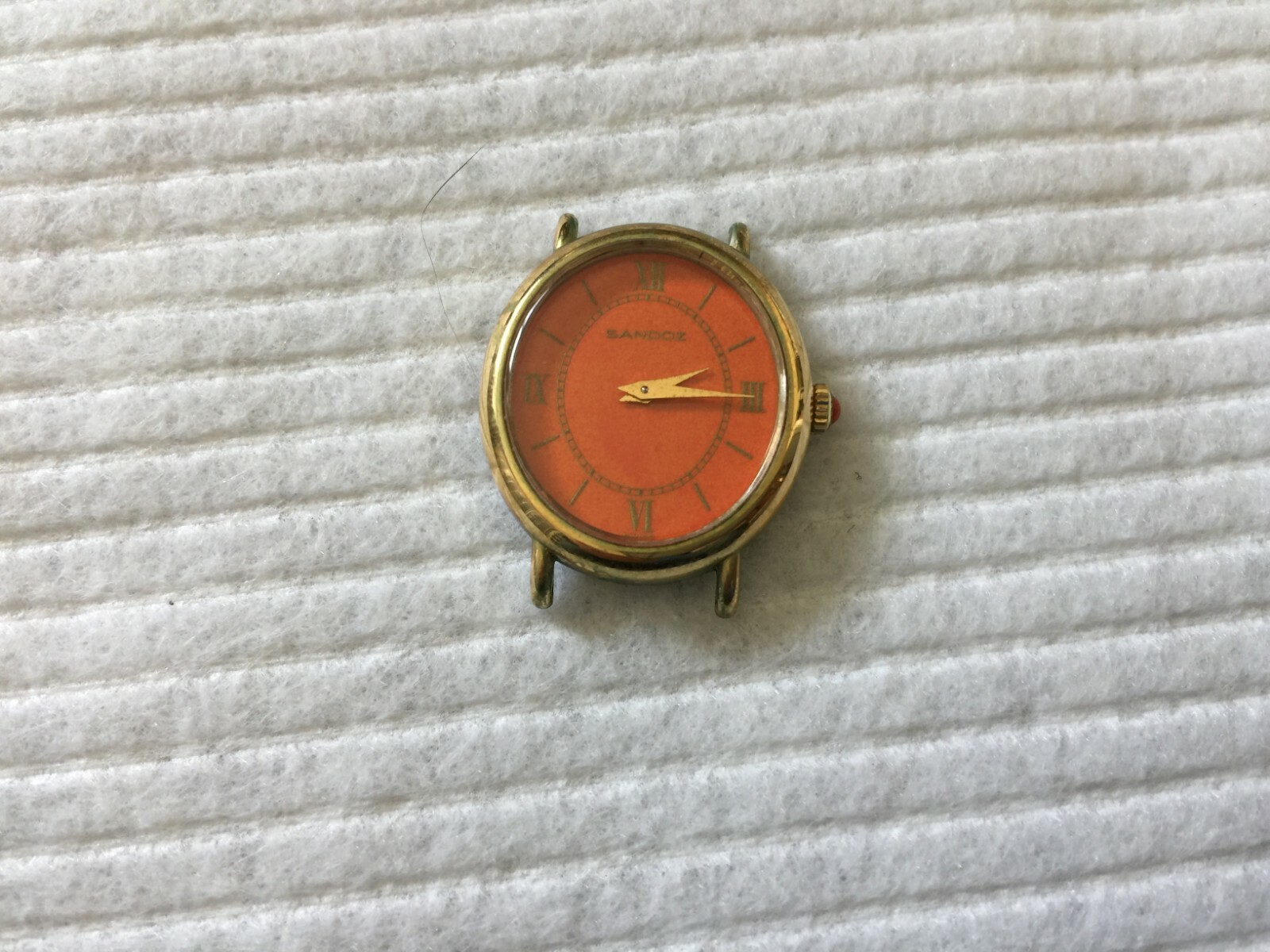 Sandoz Mechanical Wind Up Ladies Watch with an Orange Dial