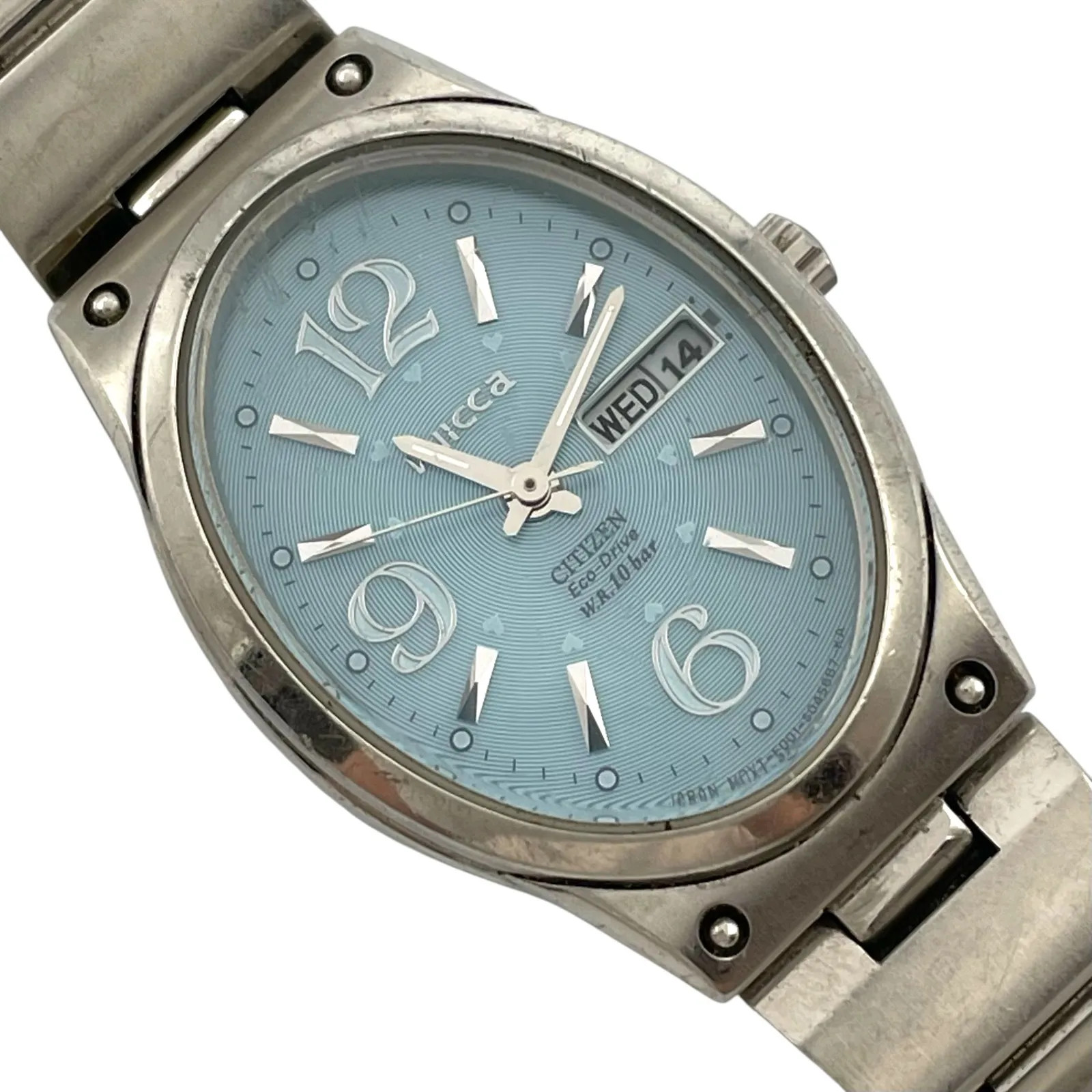 Working CITIZEN Wicca E001-S027110 Solar Women’s Analog Day-Date Oval 3-Hand