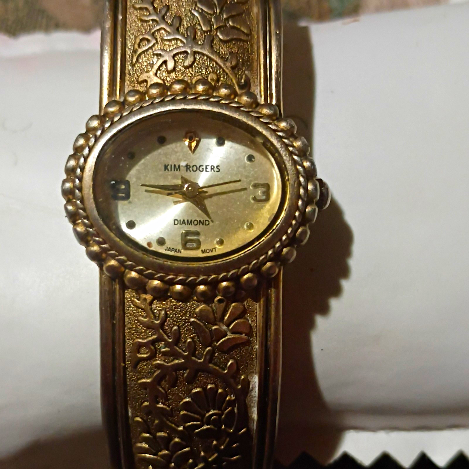 Kim Rogers Diamond Women’s Analog Quartz Floral Engraved Gold Bangle Watch