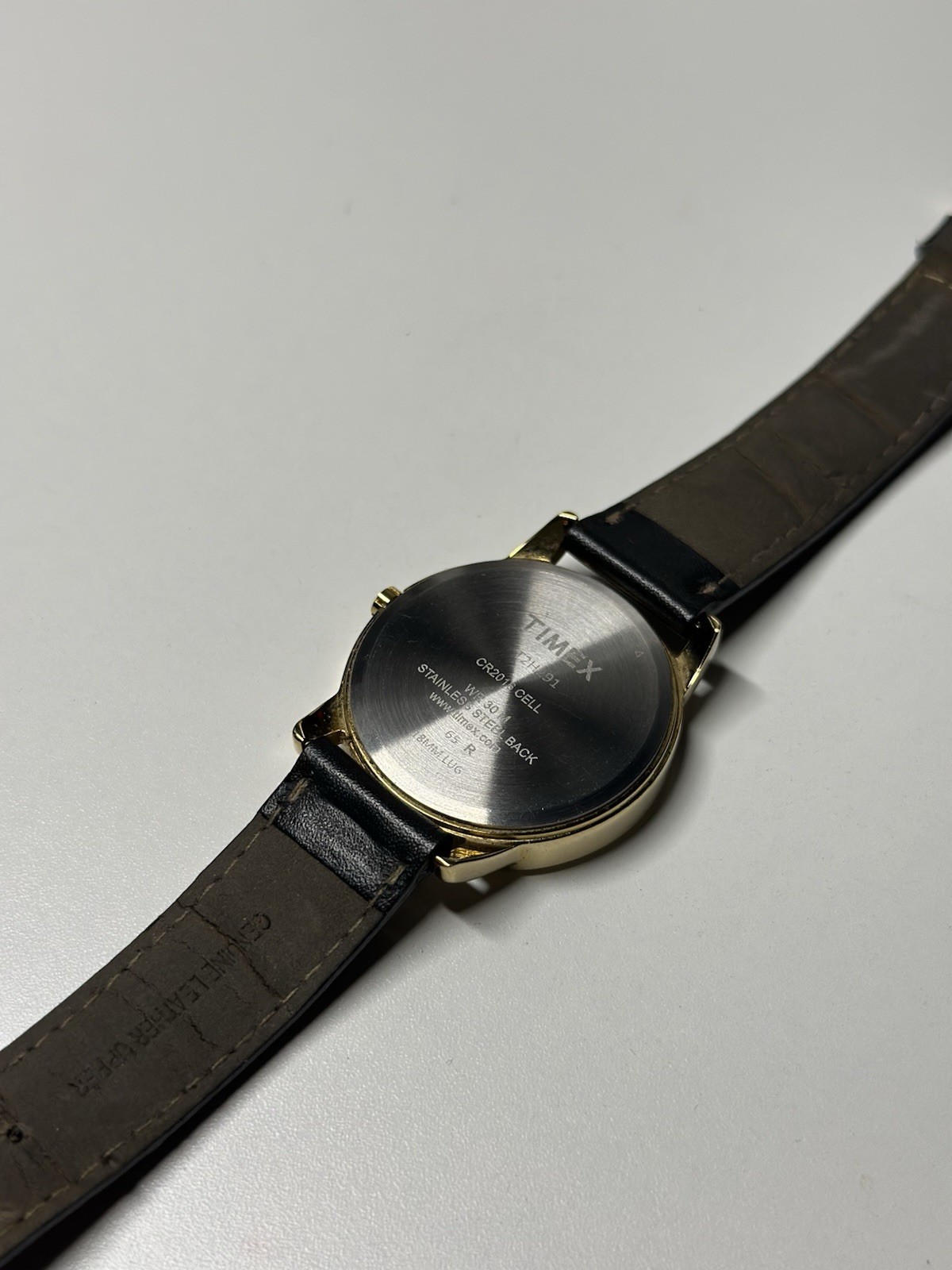 TIMEX Gold Indiglo Men’s Watch Round White Dial Black leather.