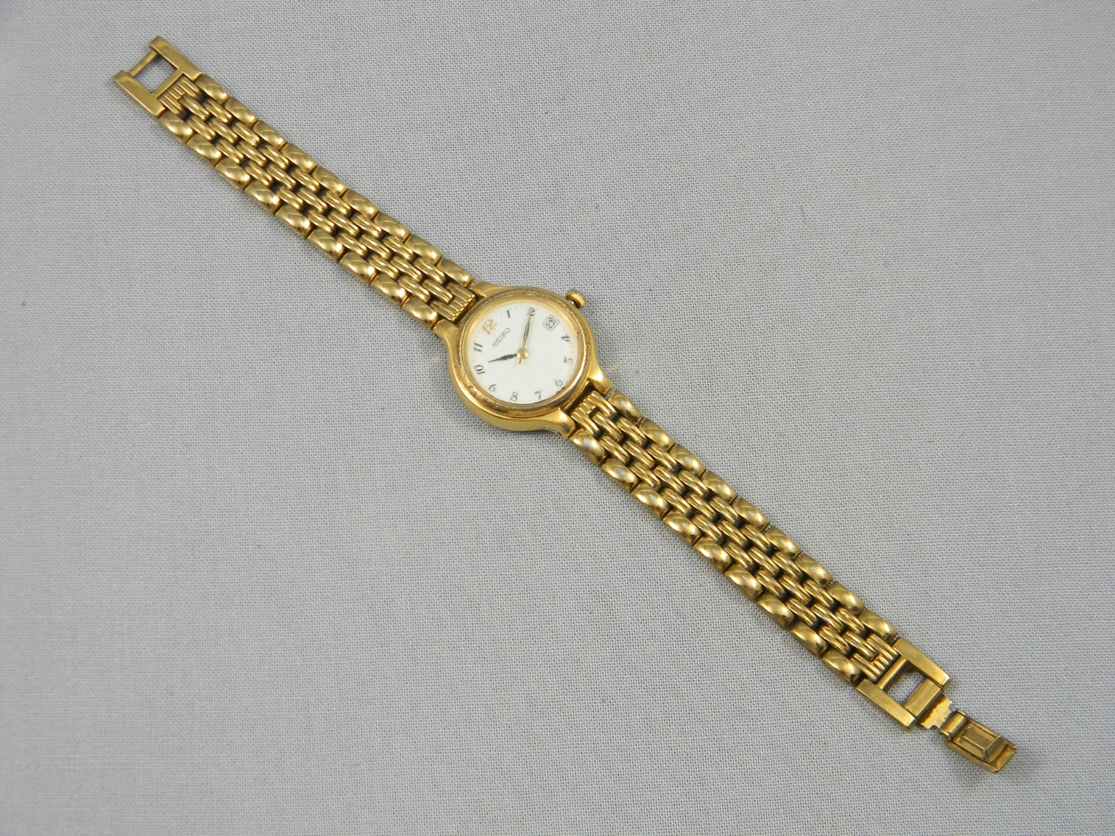 Vintage Seiko Watch Women 23mm Date Gold Tone Clasp Band 6.25″ New Battery