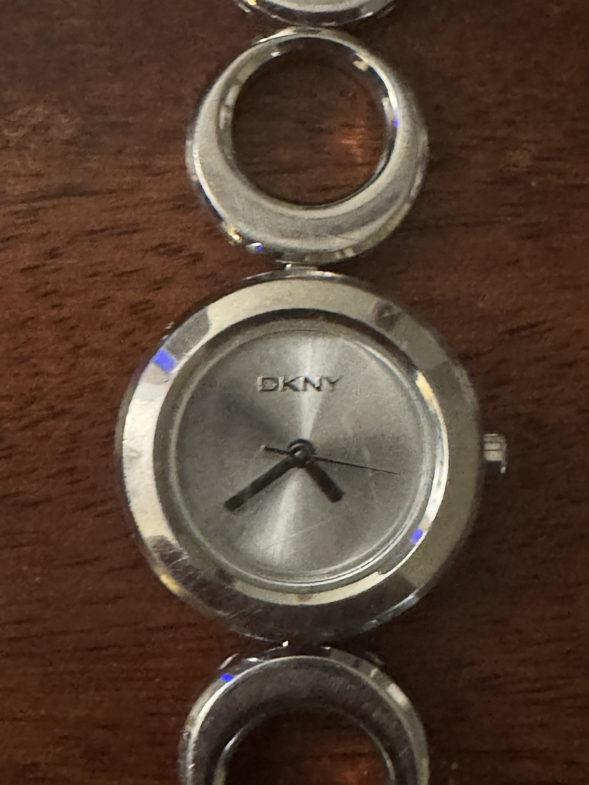 DKNY Women’s Quartz Analog Watch Silver Sunburst Dial Metal Bracelet