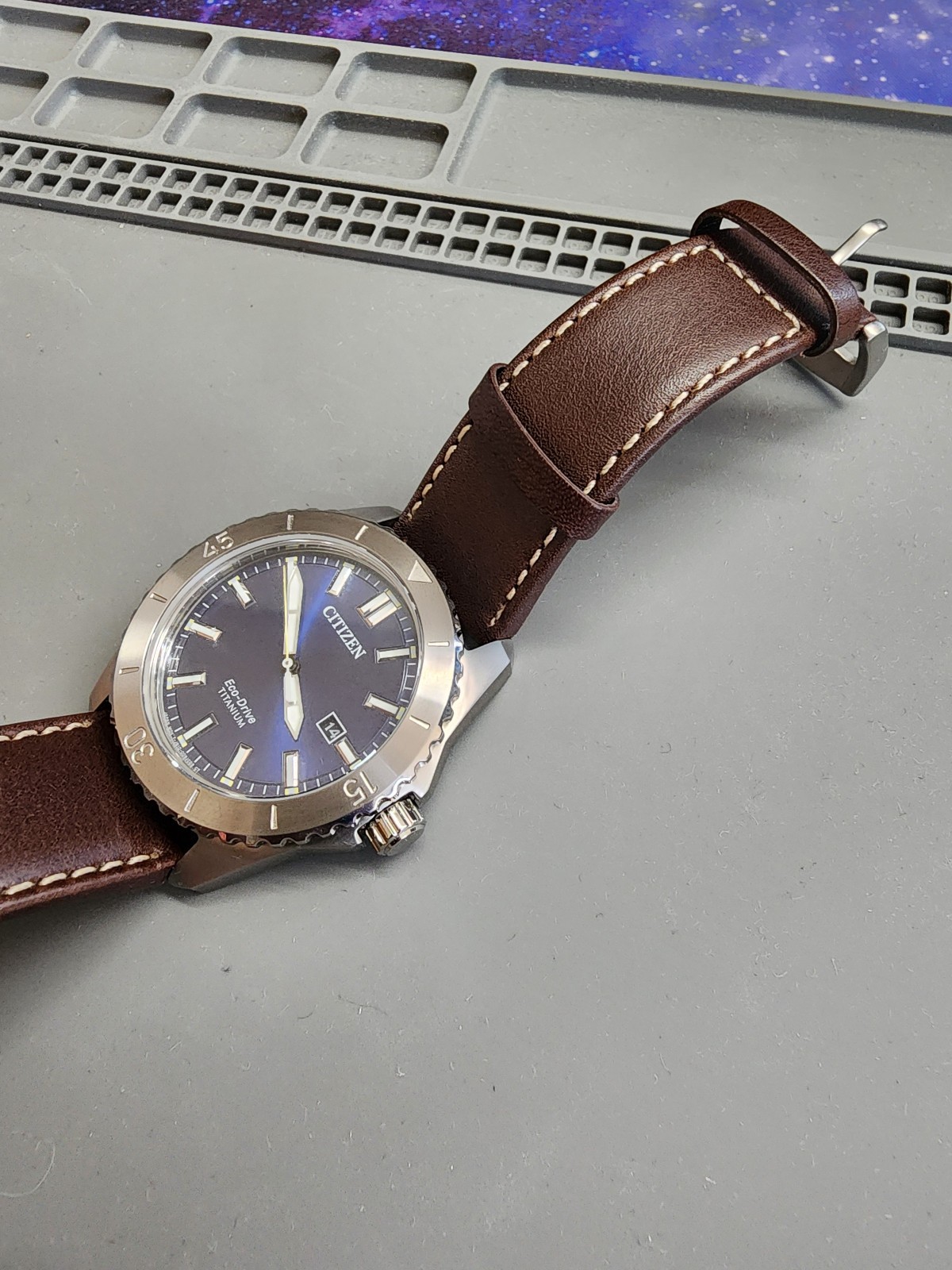 Citizen AW1840-09L Brycen Titanium Case Eco-Drive Leather Strap Blue Dial Watch
