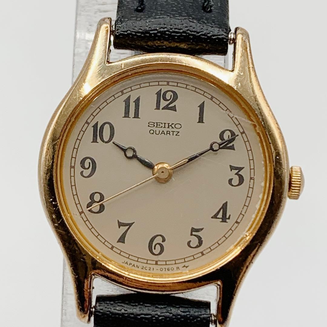 SEIKO 2C21-0170 Quartz Women’s Watch Ivory Dial Gold Case Black Strap