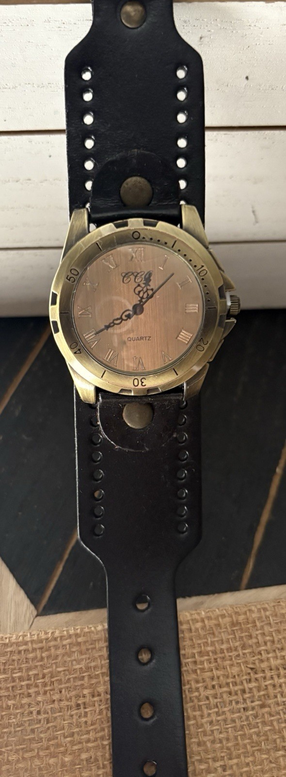 Quartz Gold Dial Roman Numeral Analog Watch Gold Case Black Leather Strap