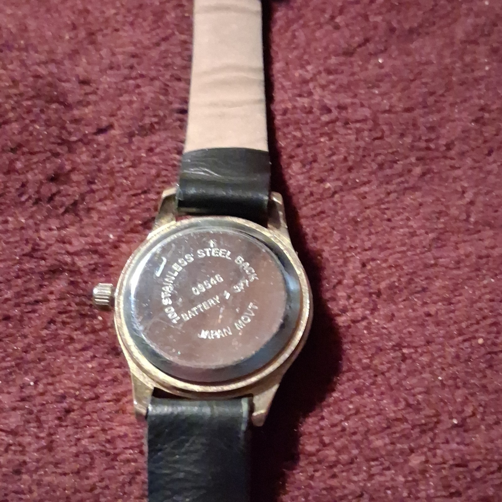 Women’s Analog Dress Wristwatch Black Dial Gold Tone Case Black Leather Band