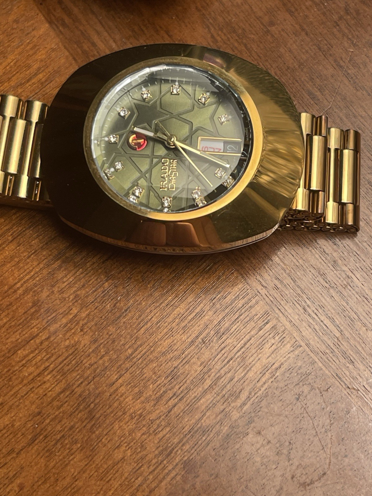 Rado DiaStar automatic Date , Oval Gold Tone Bracelet Watch Diamond Markers