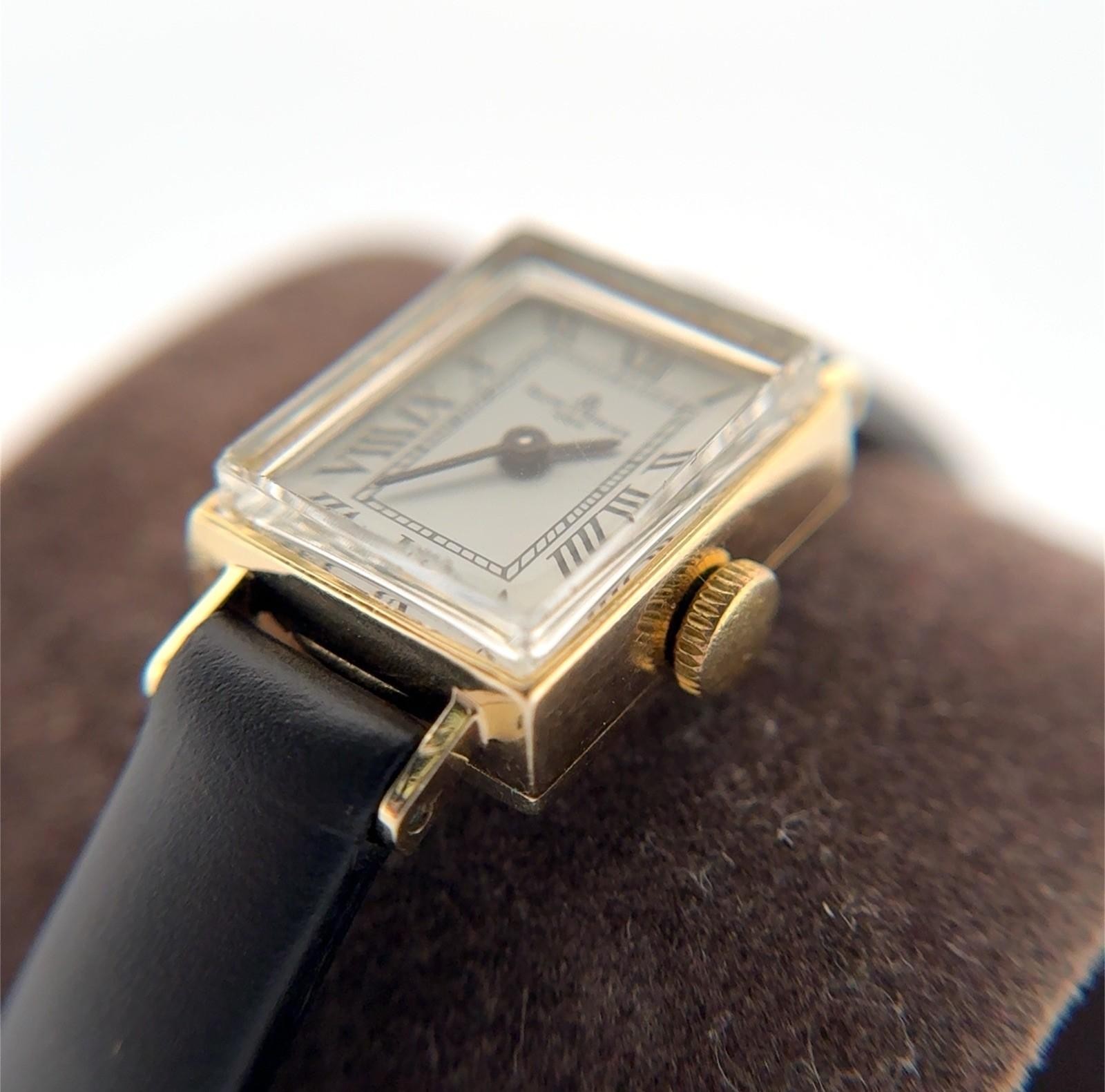 13.5mm Baume & Mercier 14k Yellow Gold Manual-Wind Ladies Swiss Made Wristwatch