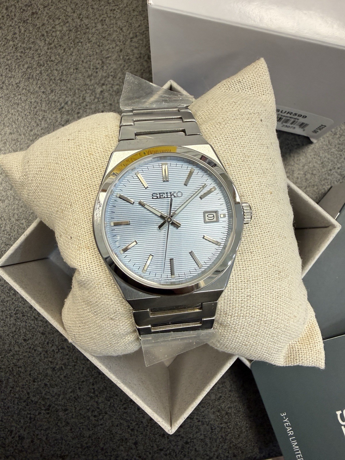 Seiko Classic Light BluePressed Dial Sapphire Crystal Steel Quartz Watch SUR557