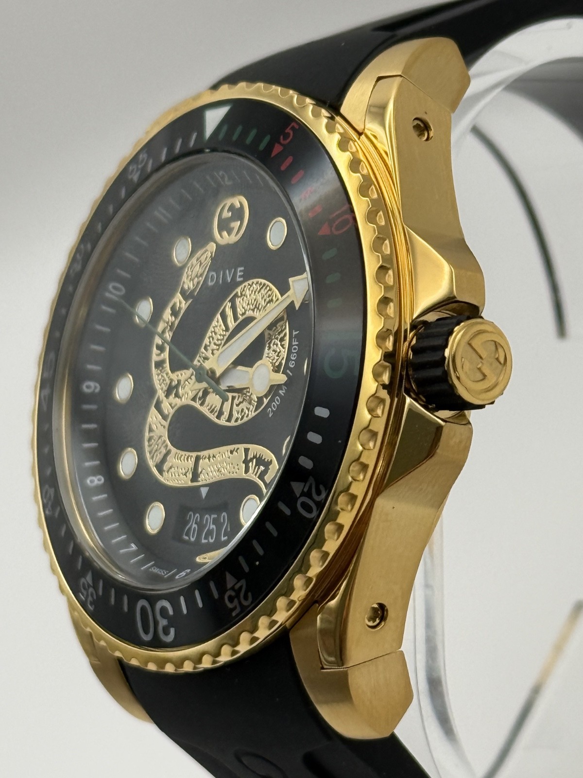 Gucci Dive Black Dial Gold-Tone Rubber Strap 45mm. Men’s Watch YA136219