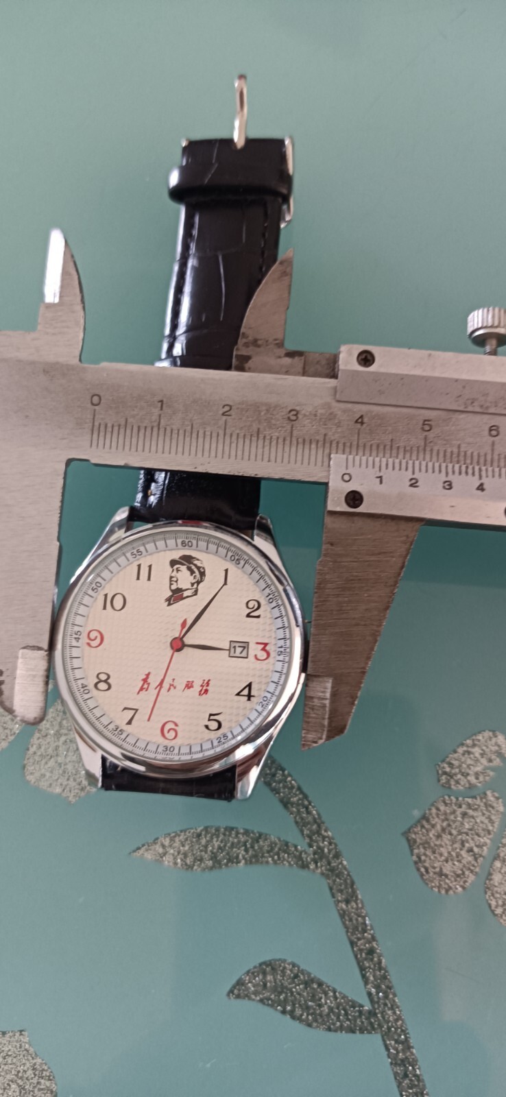 Calendar watch with leader’s head Mao Zedong wrote “Serve the People” waterproof