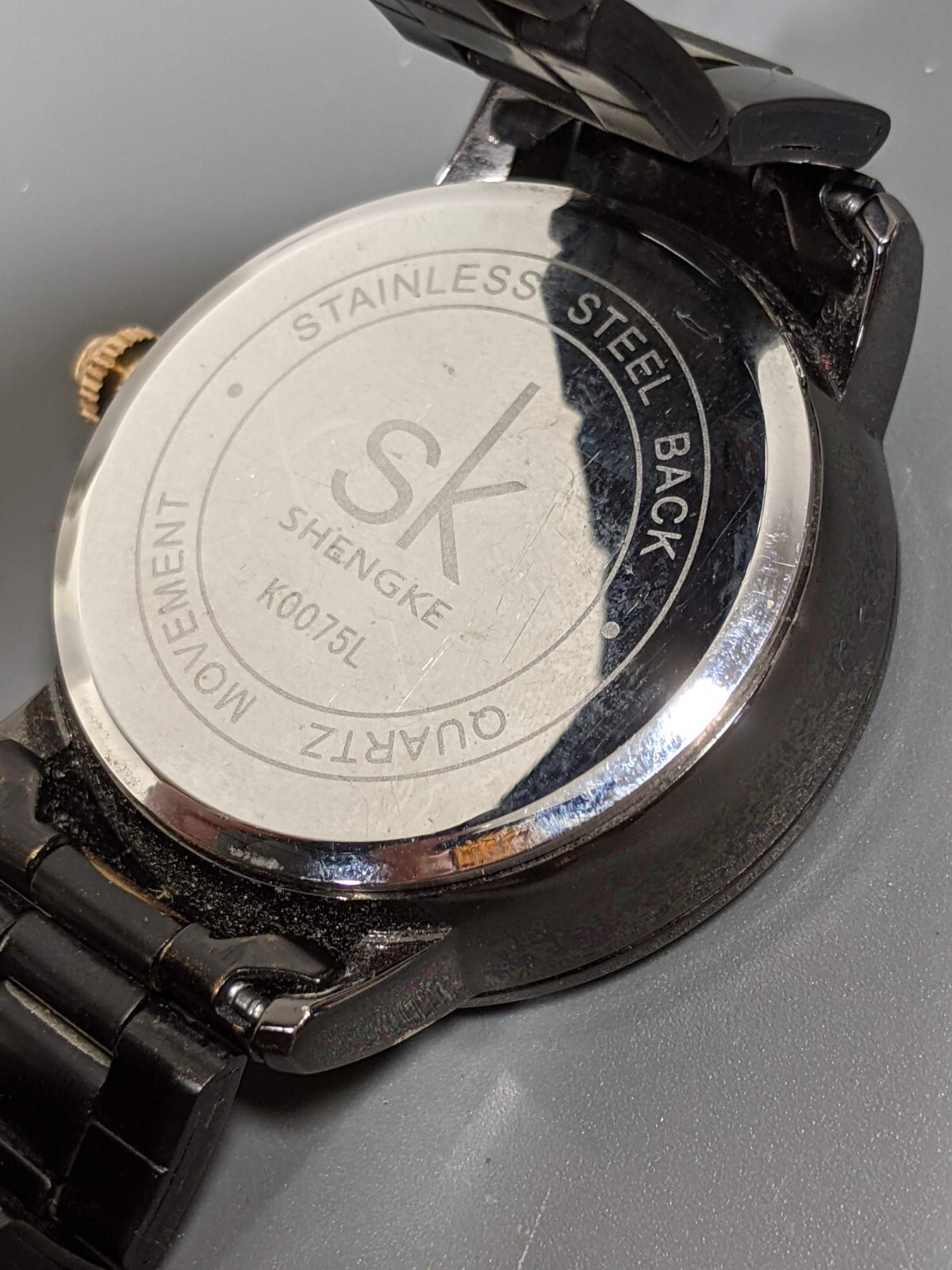 Shengke SK Womans Gunmetal Gray Gold Tone Crystal Accent Watch 6.75 in