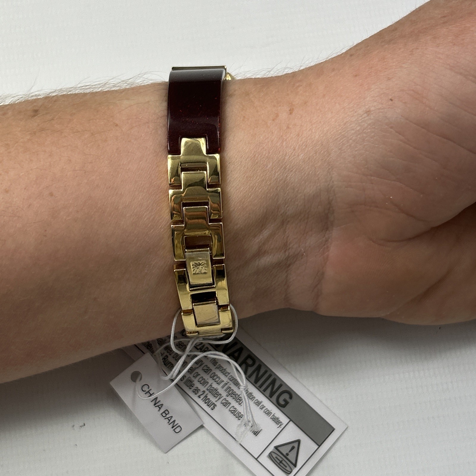 Anne Klein Women’s Quartz Burgundy Resin Gold-Tone Watch – AK/1408BYBY