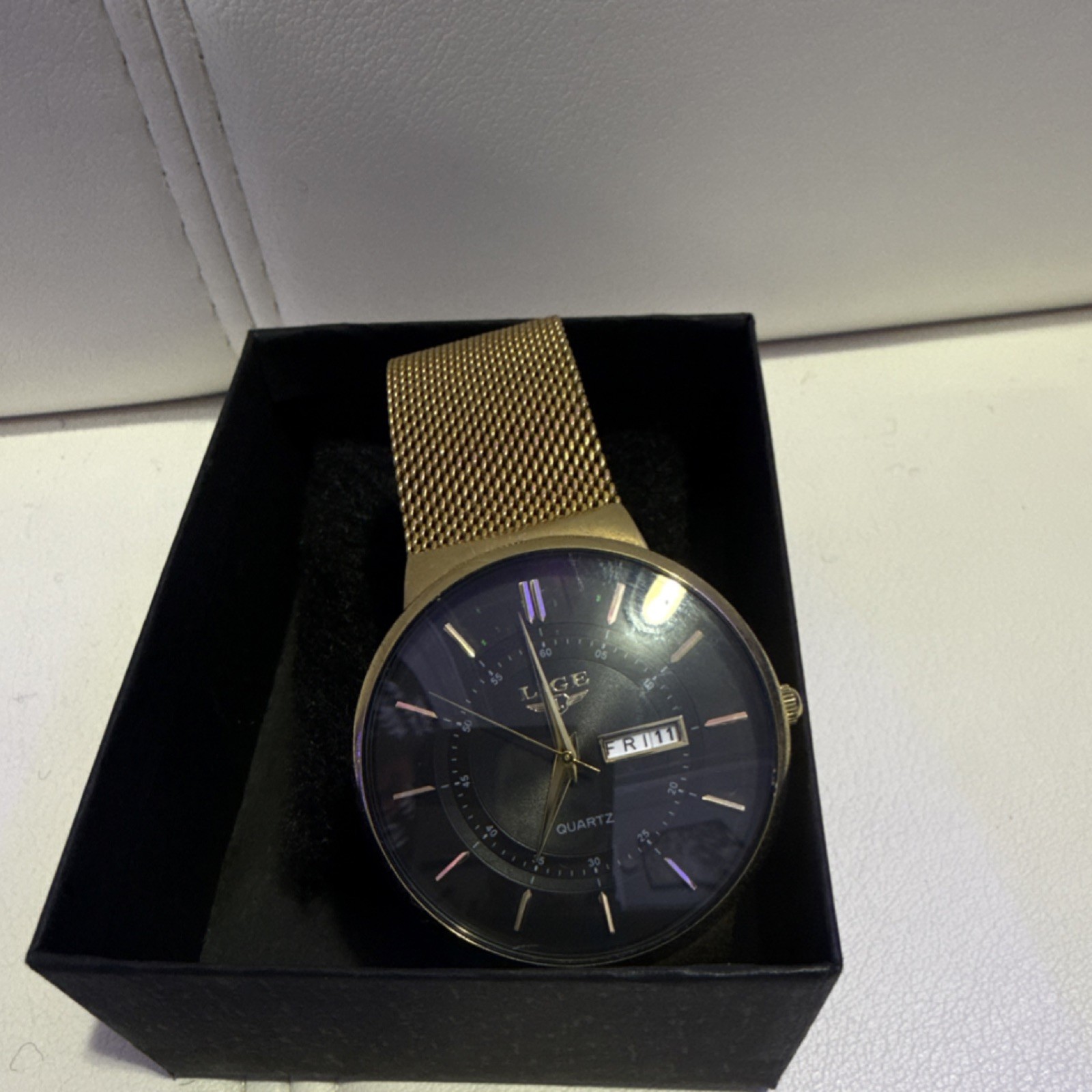 LIGE Men’s Quartz Wristwatch Gold Mesh Band Black Dial Day/Date Baton Indexes