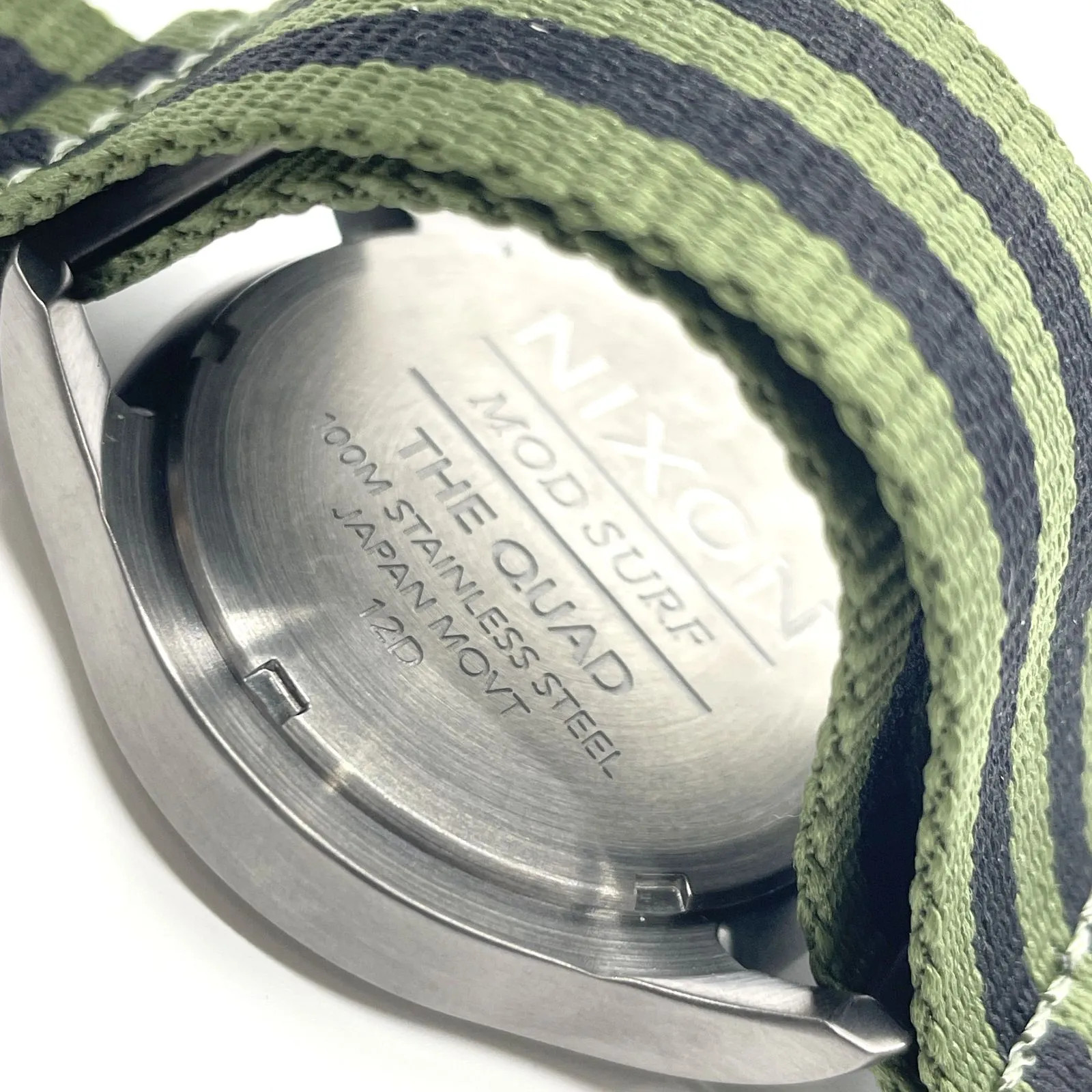 Working condition: NIXON The Quad quartz watch, nylon strap, gray dial.