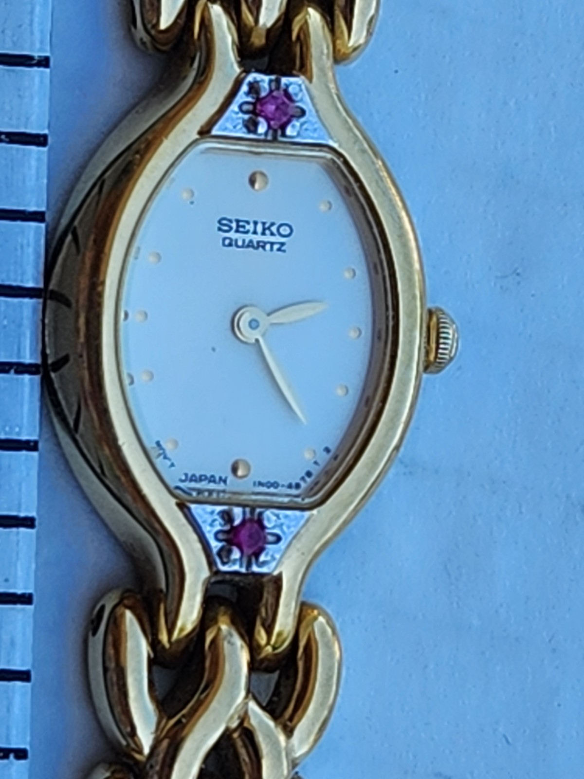 *Vintage* Seiko Ruby Bracelet Watch with Gold-tone Oval Case 6.5″ Ivory Dial