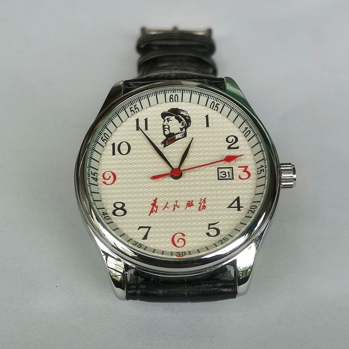Calendar watch with leader’s head Mao Zedong wrote “Serve the People” waterproof