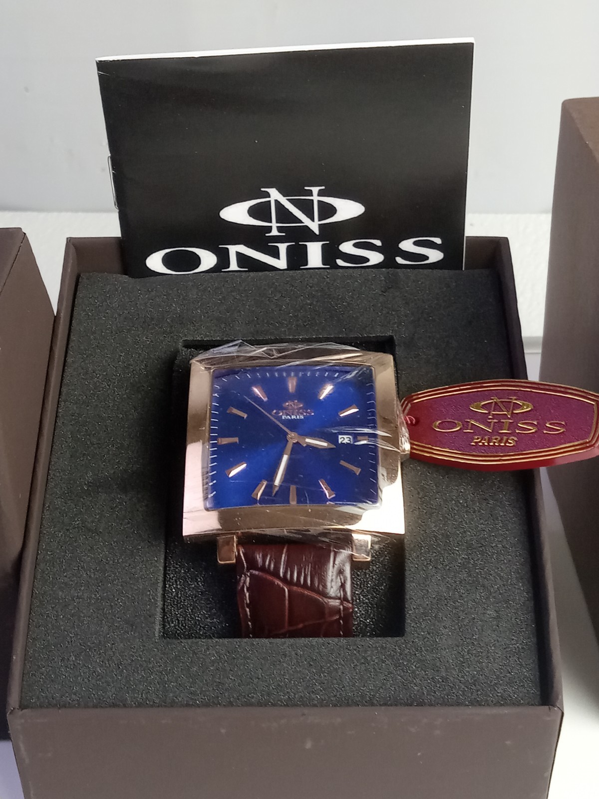 Oniss Men’s Rose Tone Blue SunRay 3 Hand Date Dial Sapphire Crystal Watch