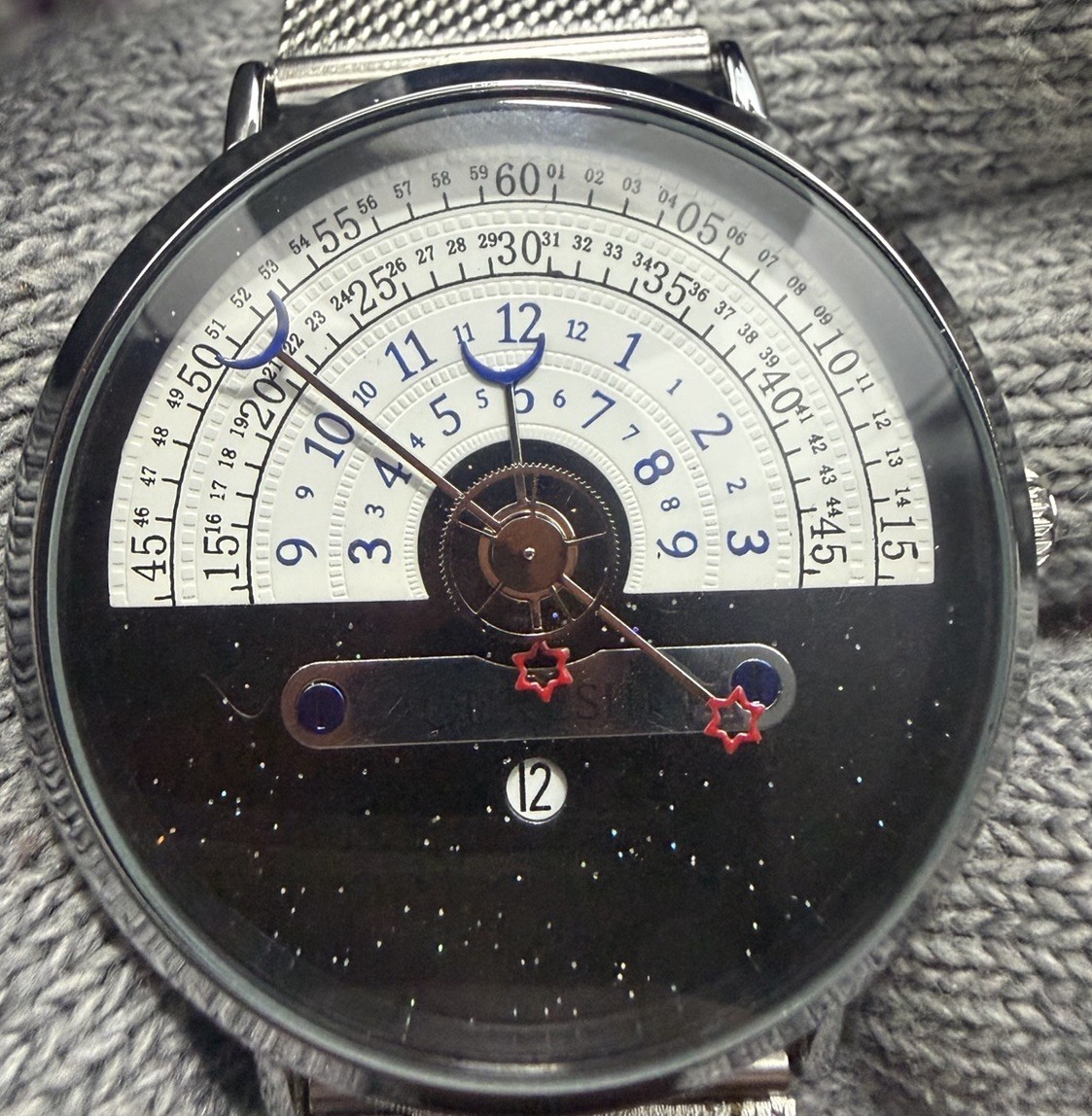 OUKESHI Orbit Dial Quartz Watch Mens Moon and Stars Pointer Steel Mesh Band