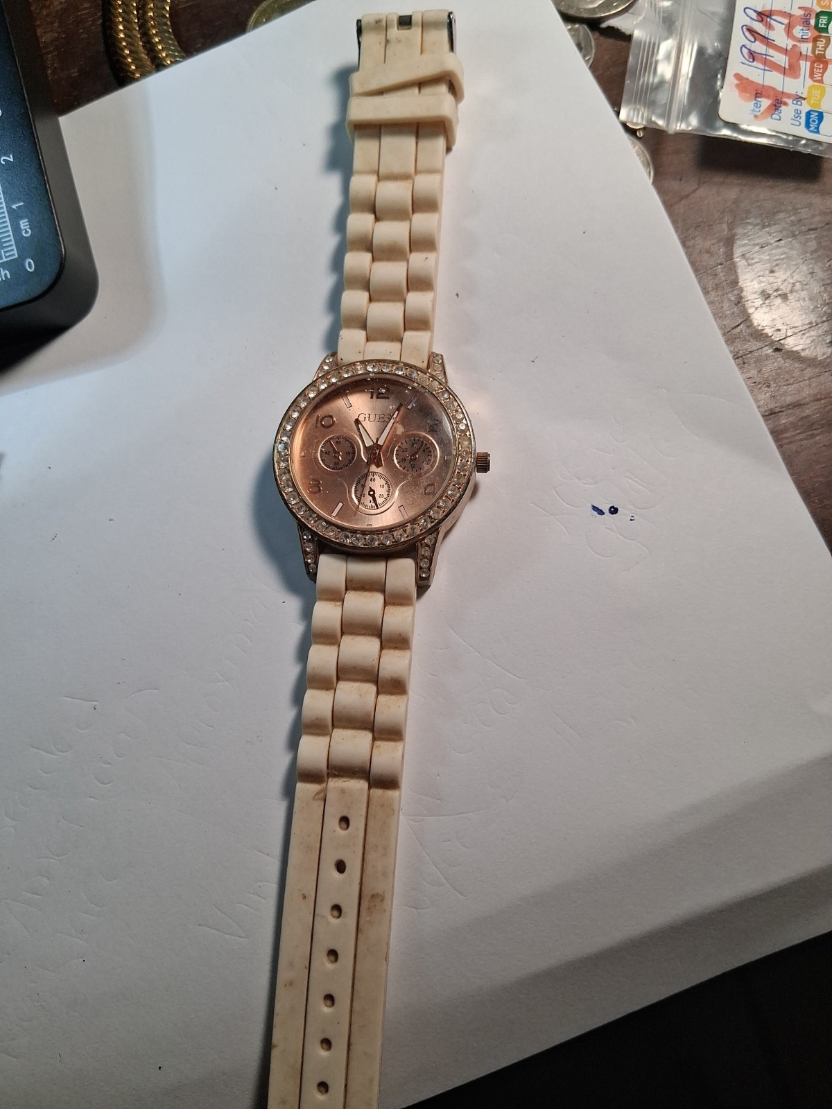 Guess women brown dial watch beige strap Rose gold tone case W0579l2/U0579L2