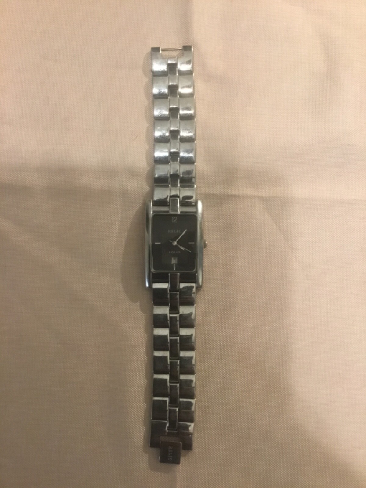 RARE SS RELIC FOLIO CURVED CASE MENS QUARTZ WRISTWATCH water resistant