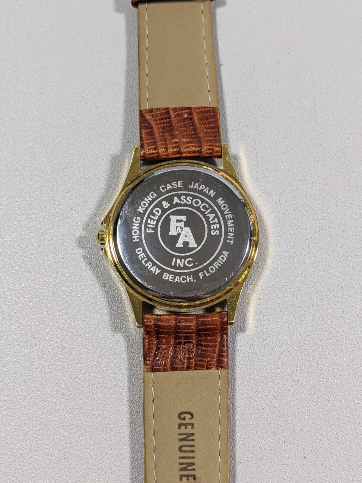 Macri’s Deli Celebrity Golf Classic Round Gold Tone Case 33 mm Leather Bnd Watch